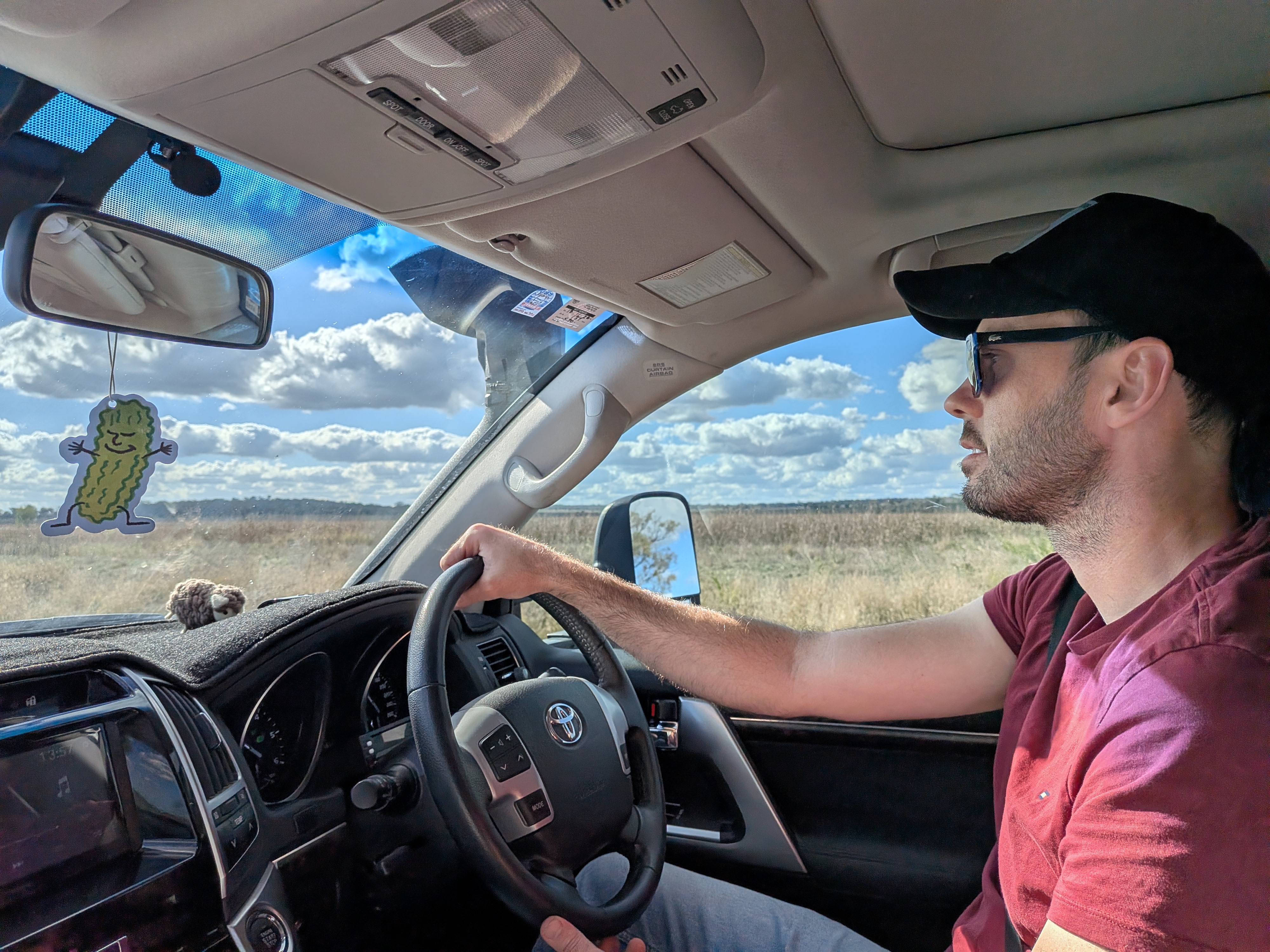 Dylan driving Reg through the open plains