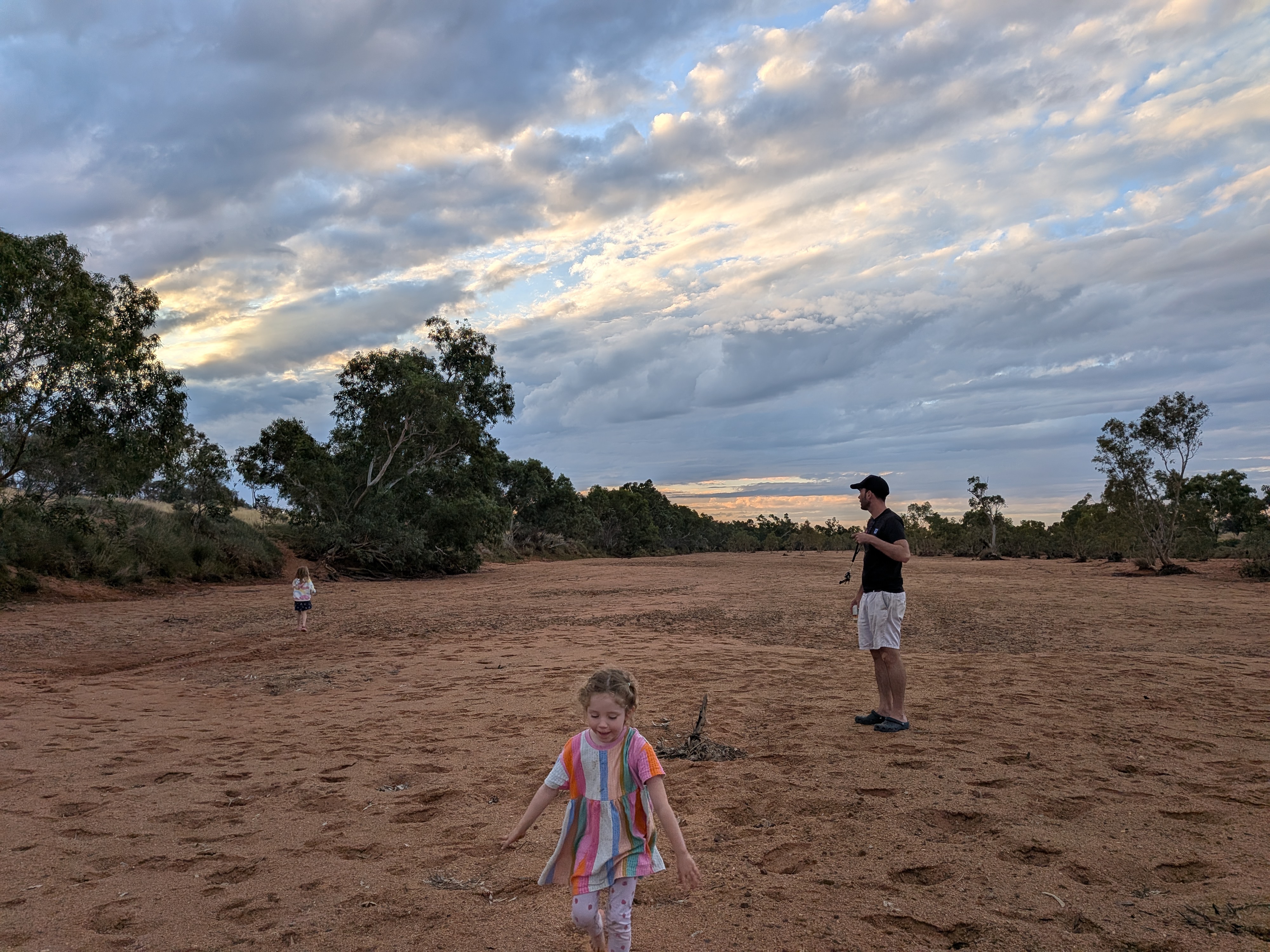 Dylan and the girls in the dry creek bed at Barrow Creek