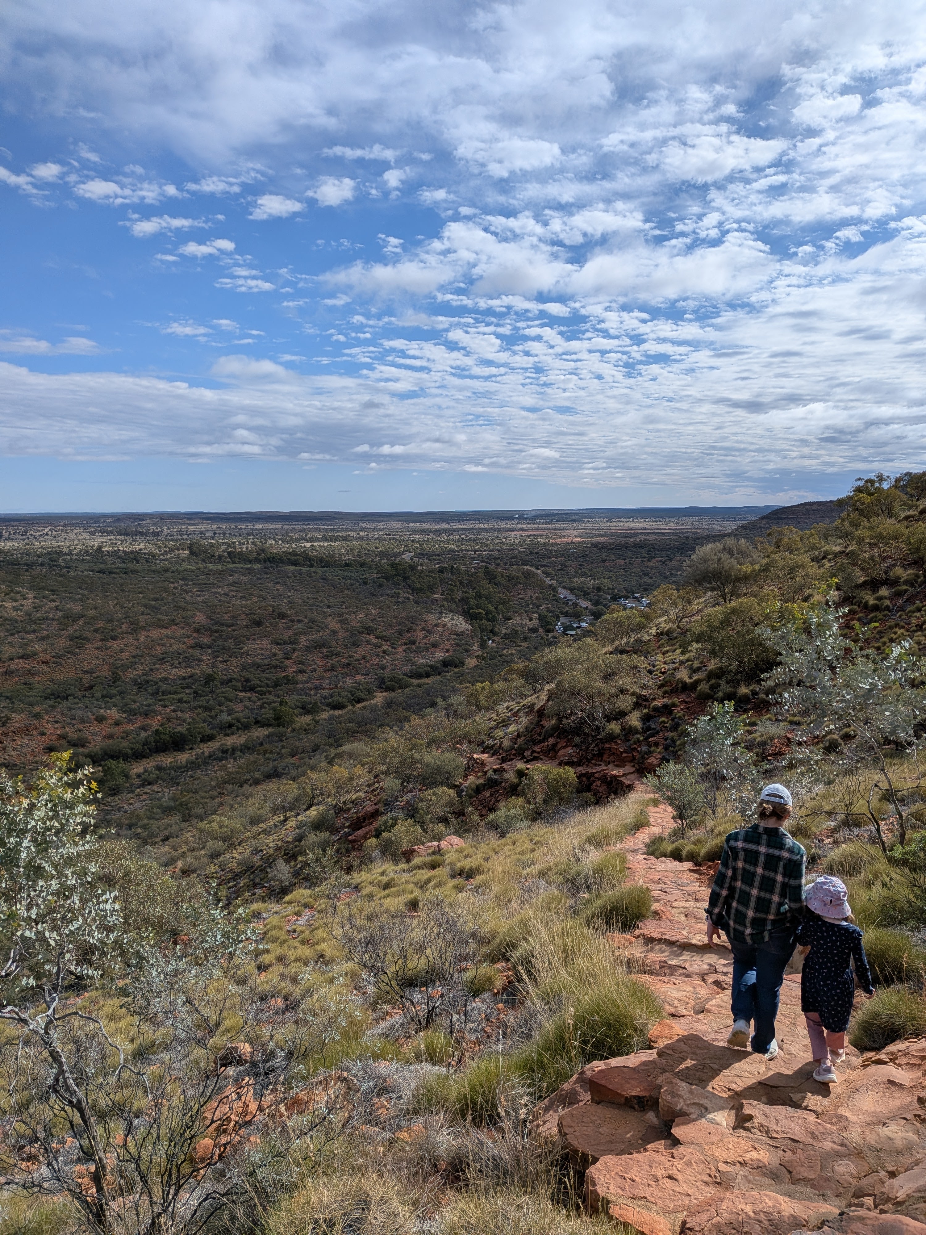 Erin and Leah walking the track with the valley stretching out ahead
