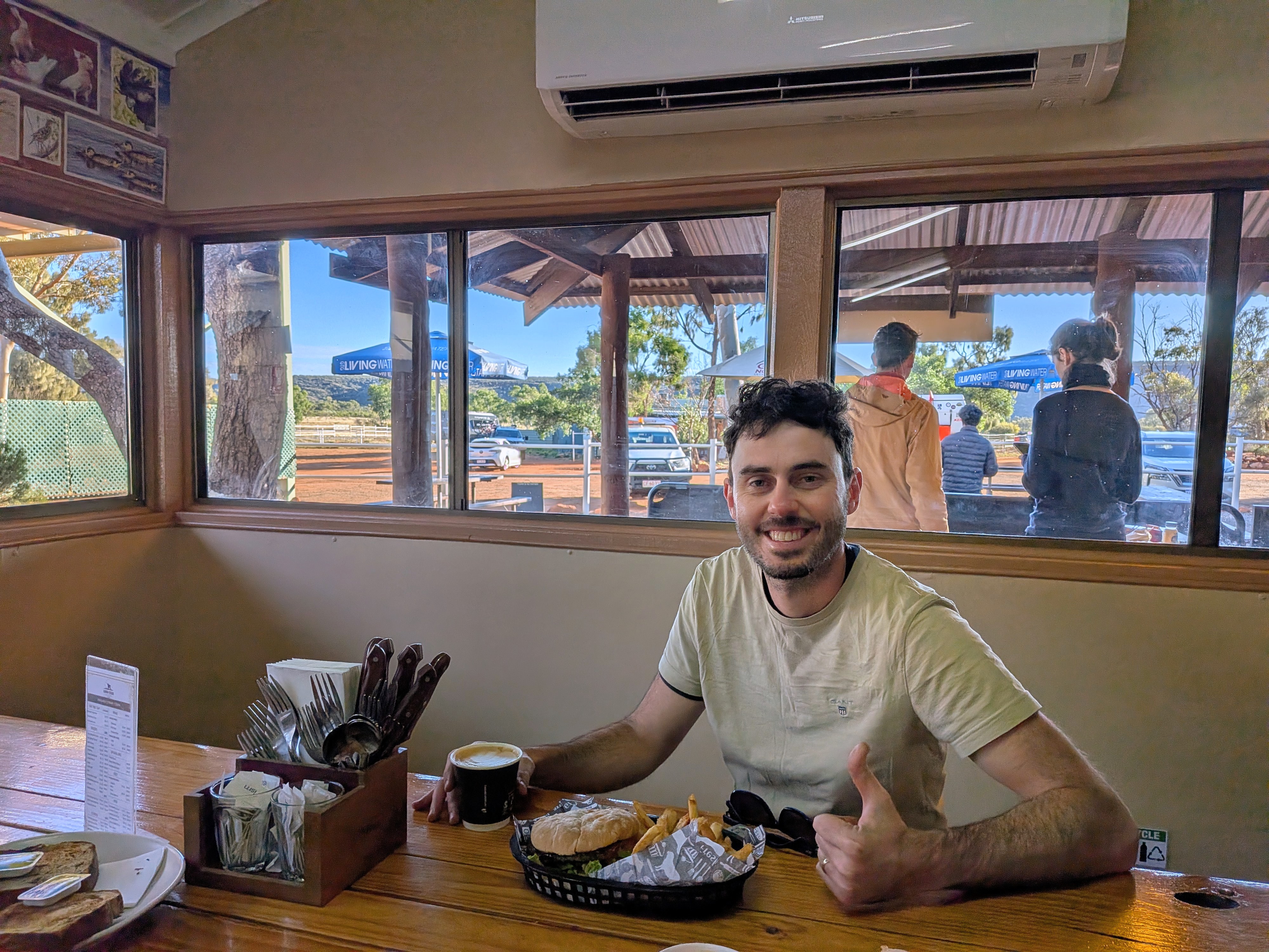 Dylan with the camel burger at Kings Creek Station cafe