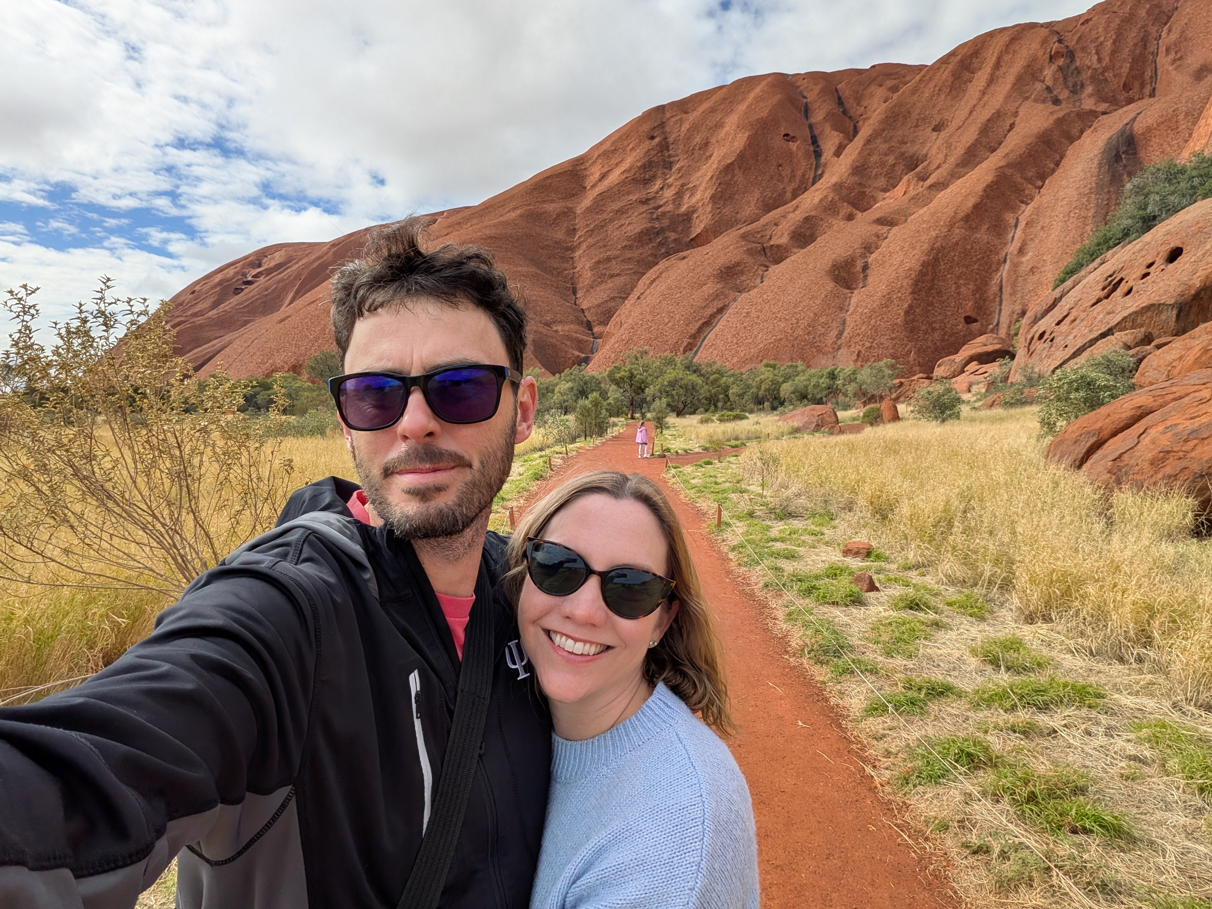 Dylan and Erin selfie on the Kuniya Walk path with Uluru behind