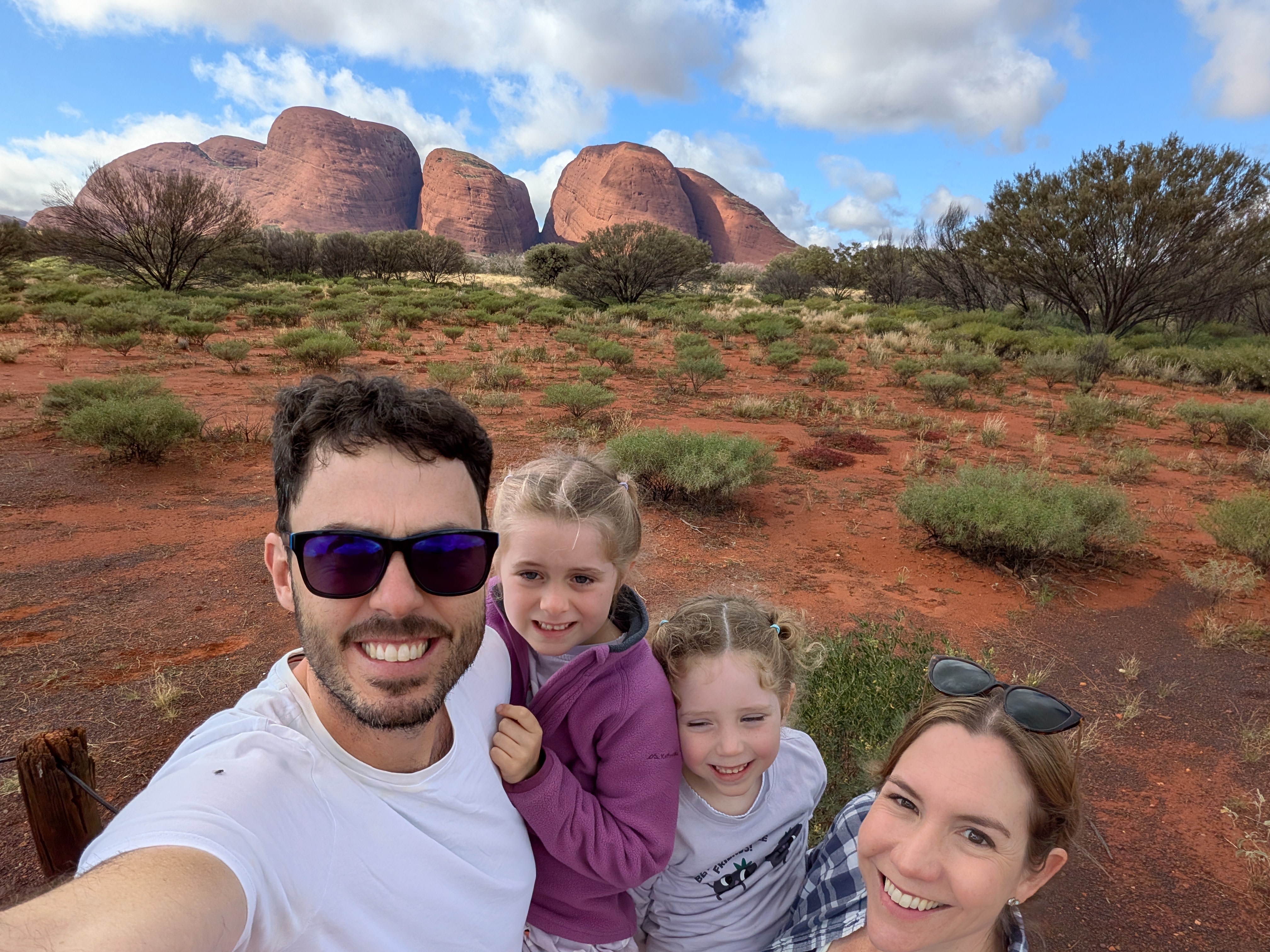 Family selfie with Kata Tjuta in the sunshine