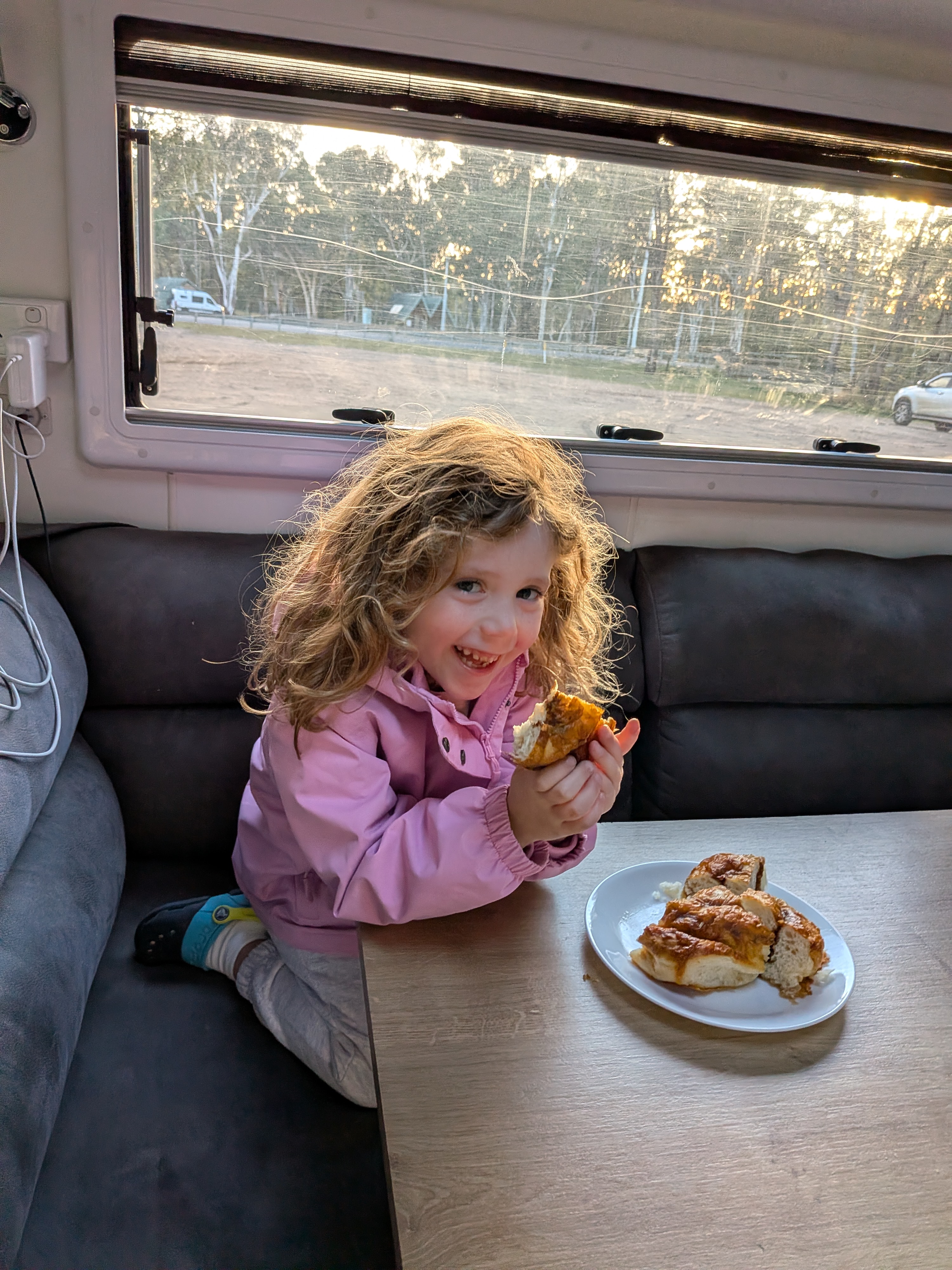 Leah having breakfast in the van