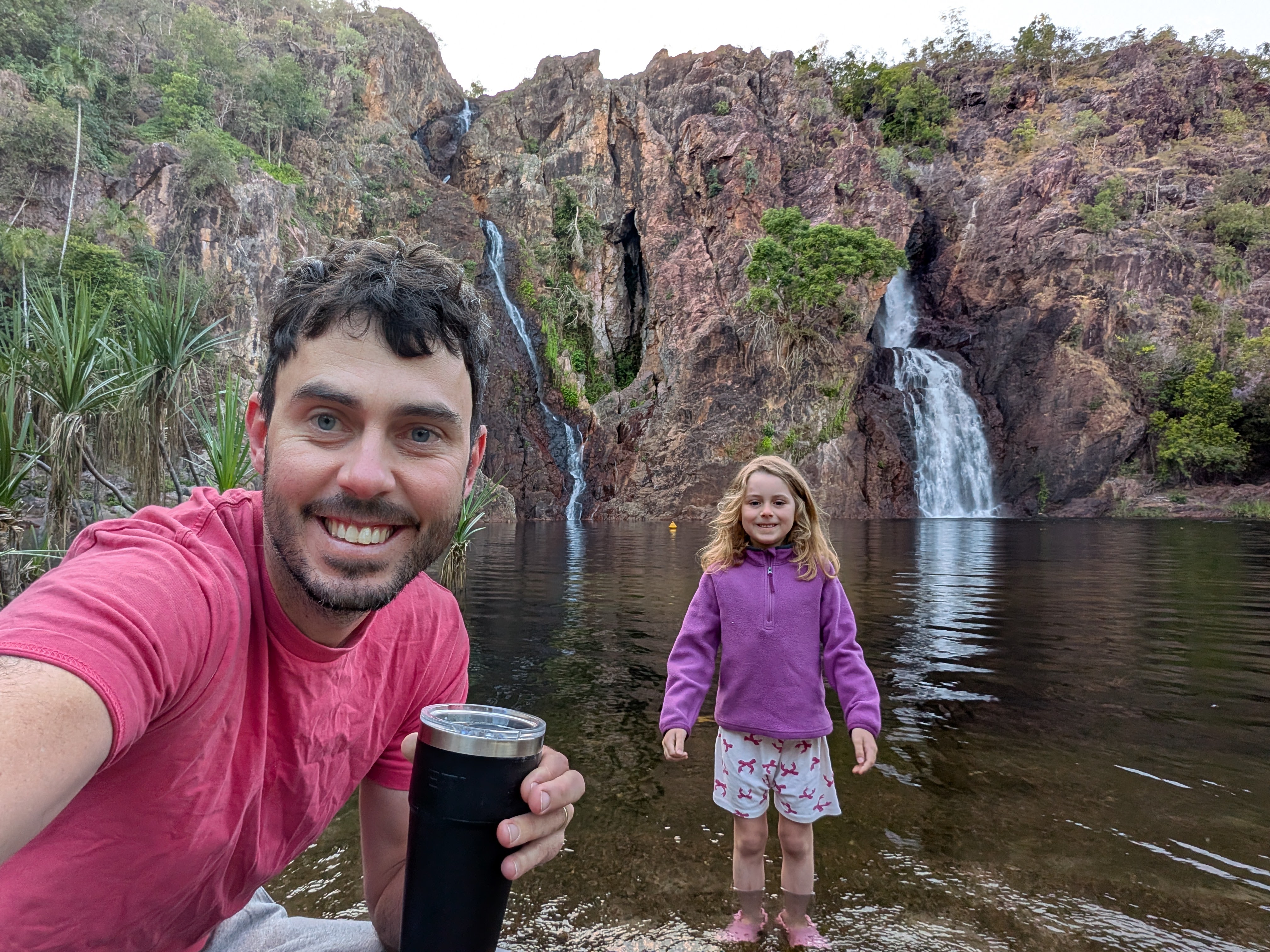 Dylan's morning coffee at the falls, with company ankle-deep in the shallows