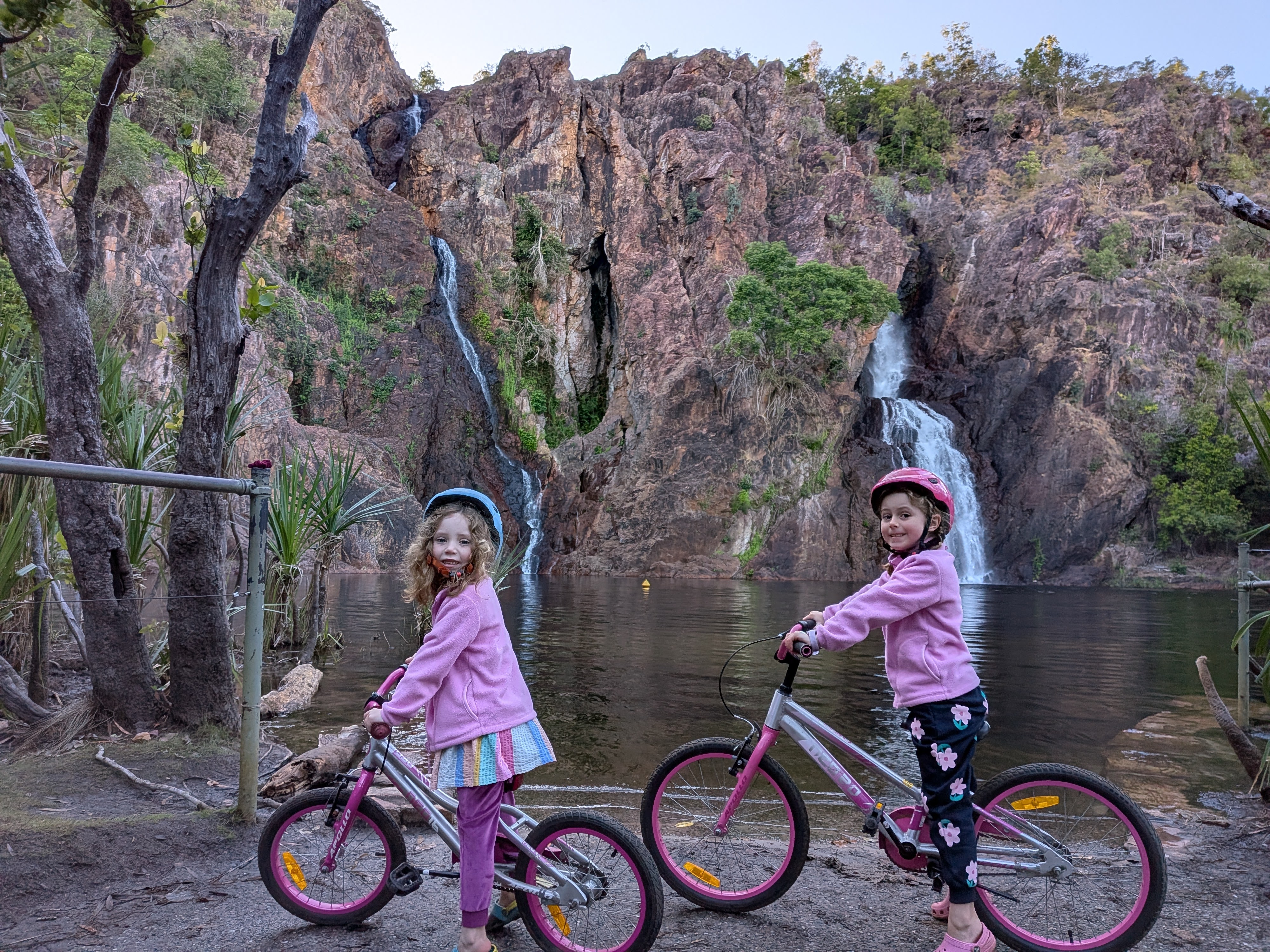 One last morning ride — the girls and their bikes in front of Wangi Falls