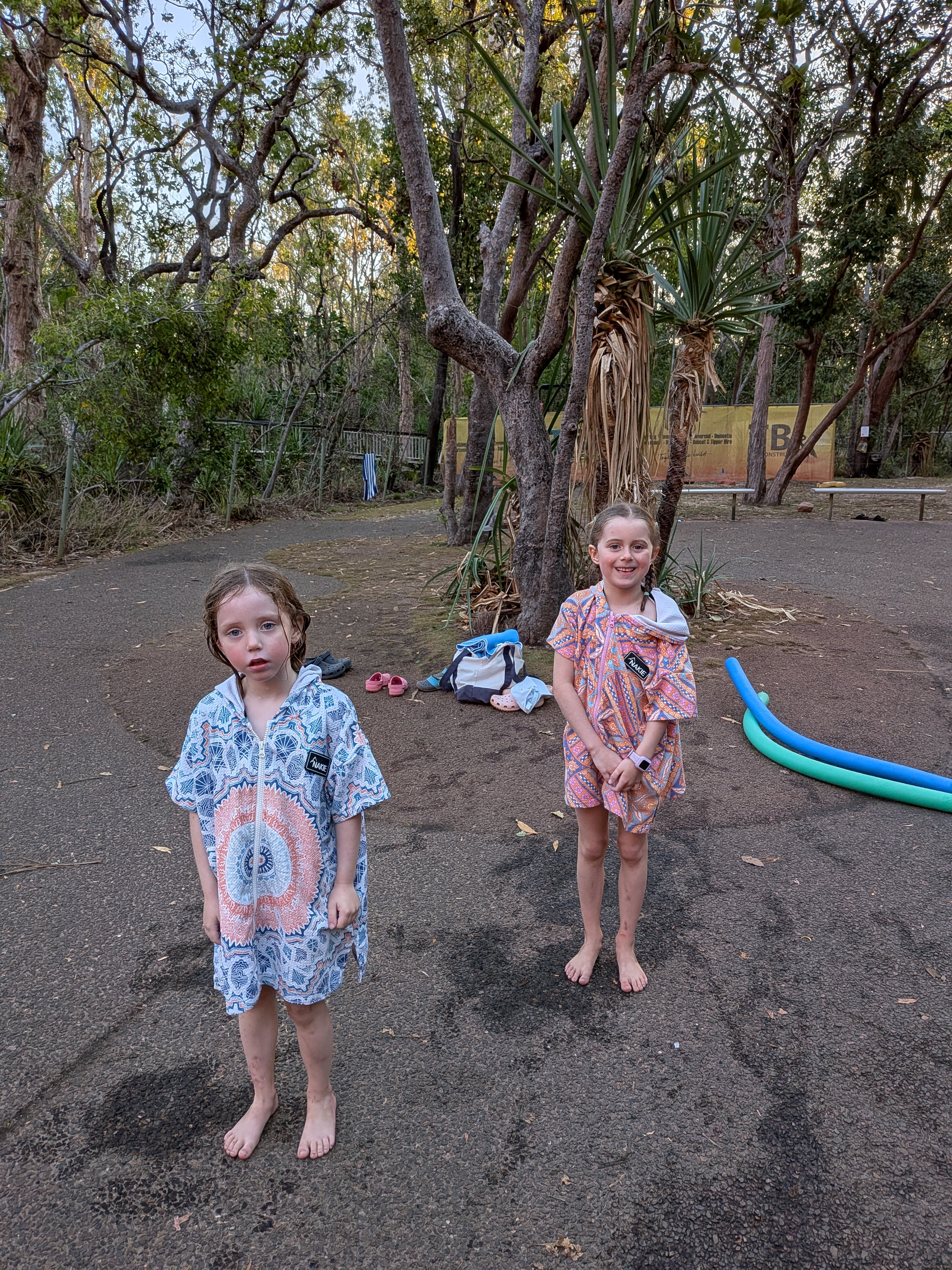 Post-swim towel ponchos at dusk — goodbye, Wangi