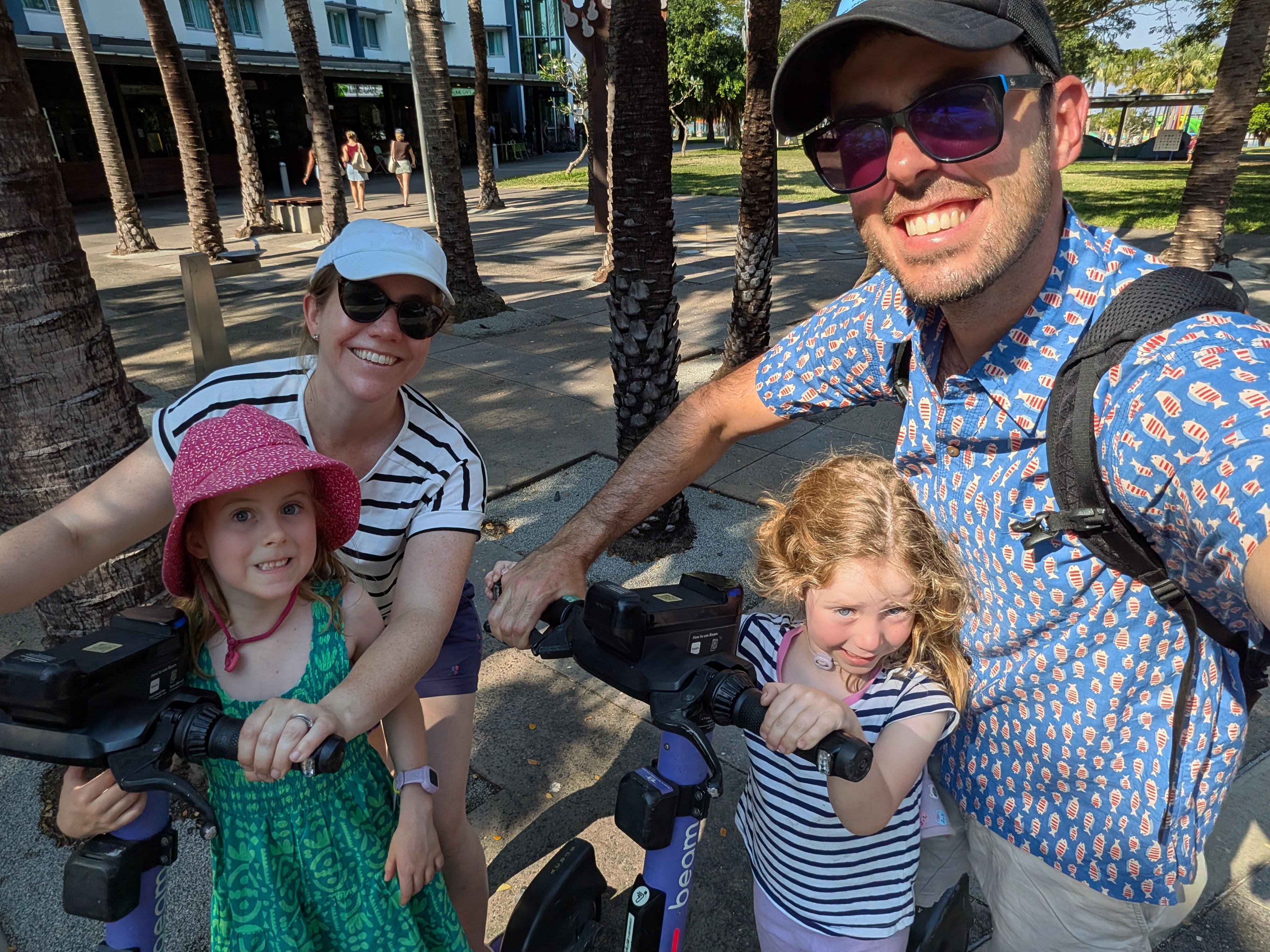 Family selfie on the e-scooters at the Darwin waterfront &mdash; Hazel with Erin, Leah with Dylan