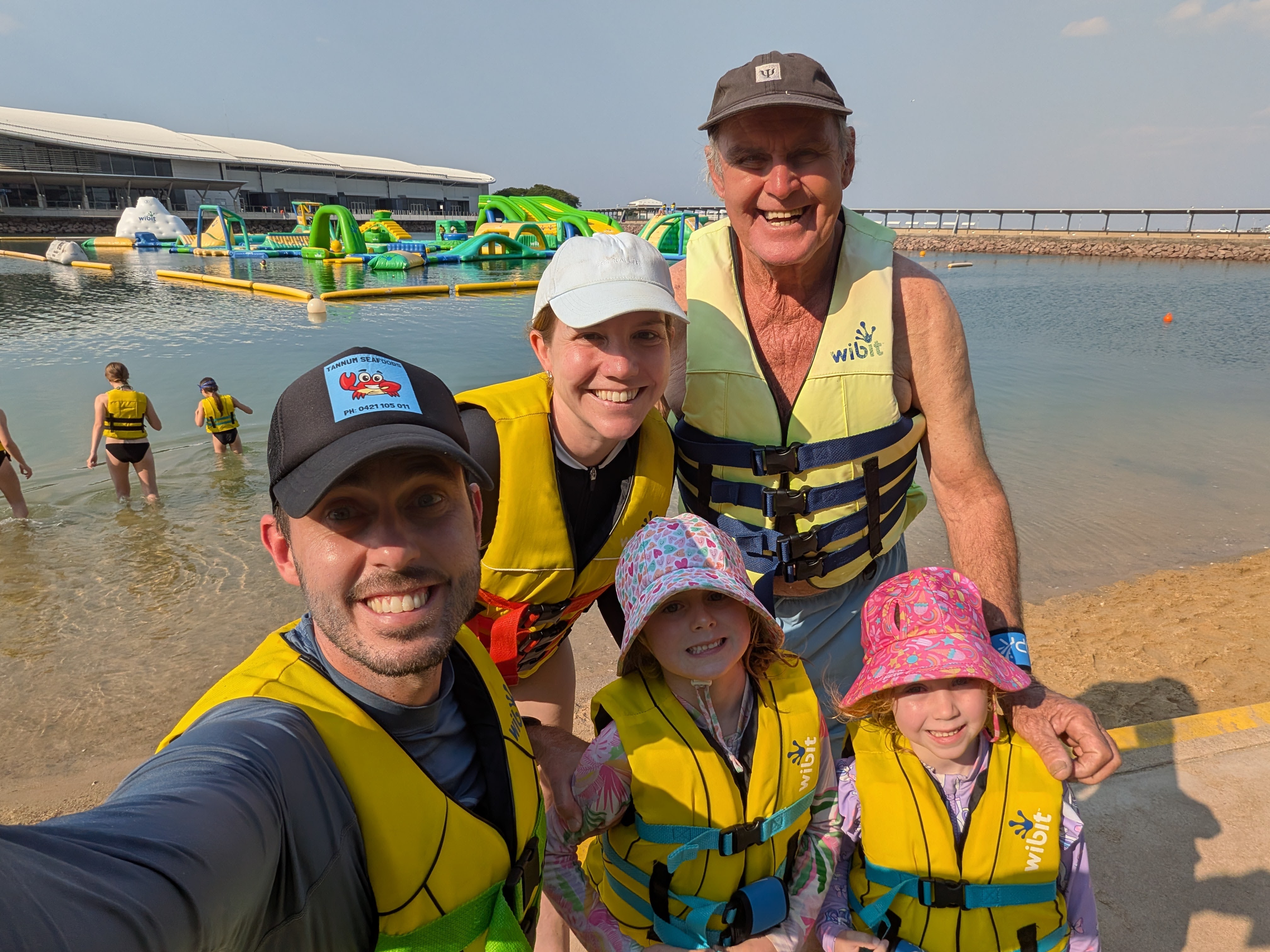 Life jackets on with Pa, ready for the Aqua Park inflatables