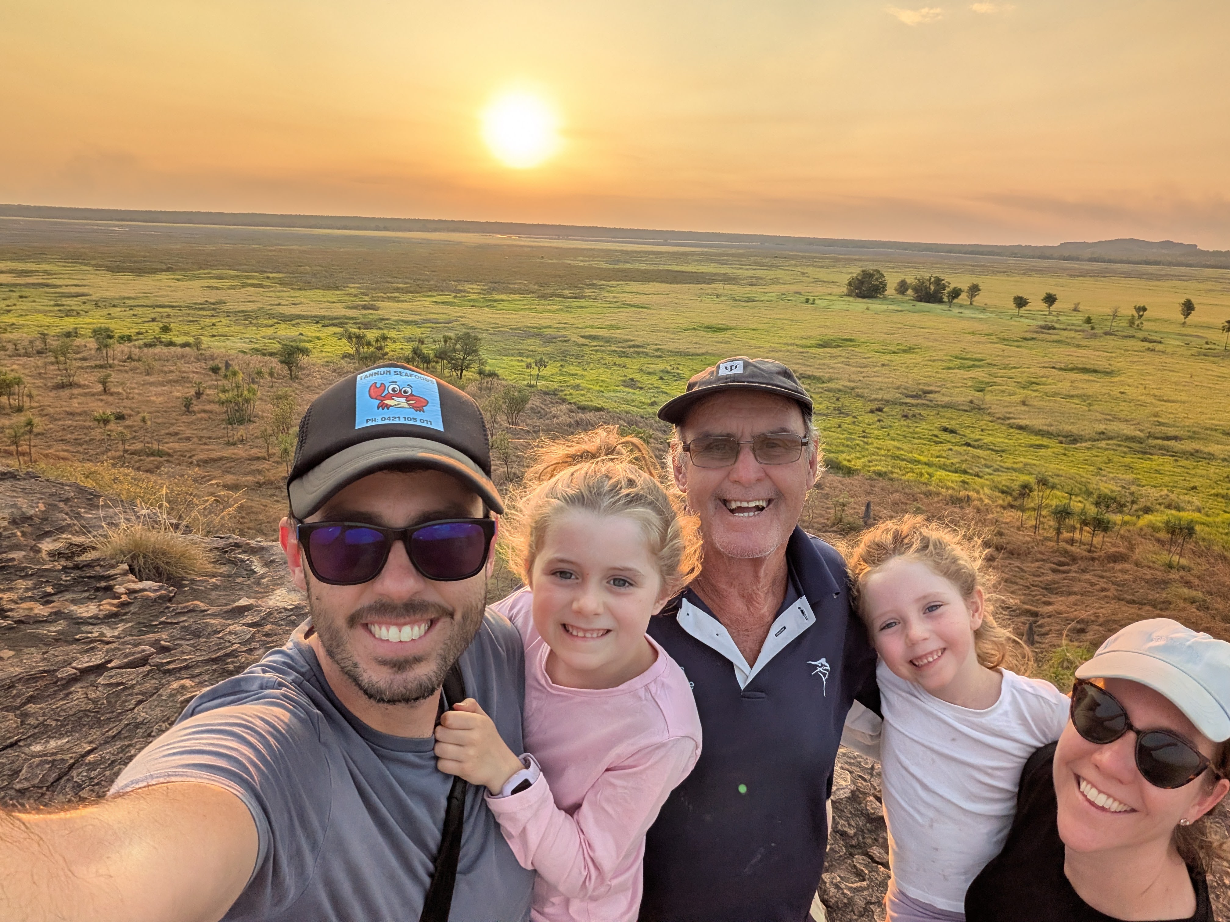 Family sunset selfie on top of Ubirr