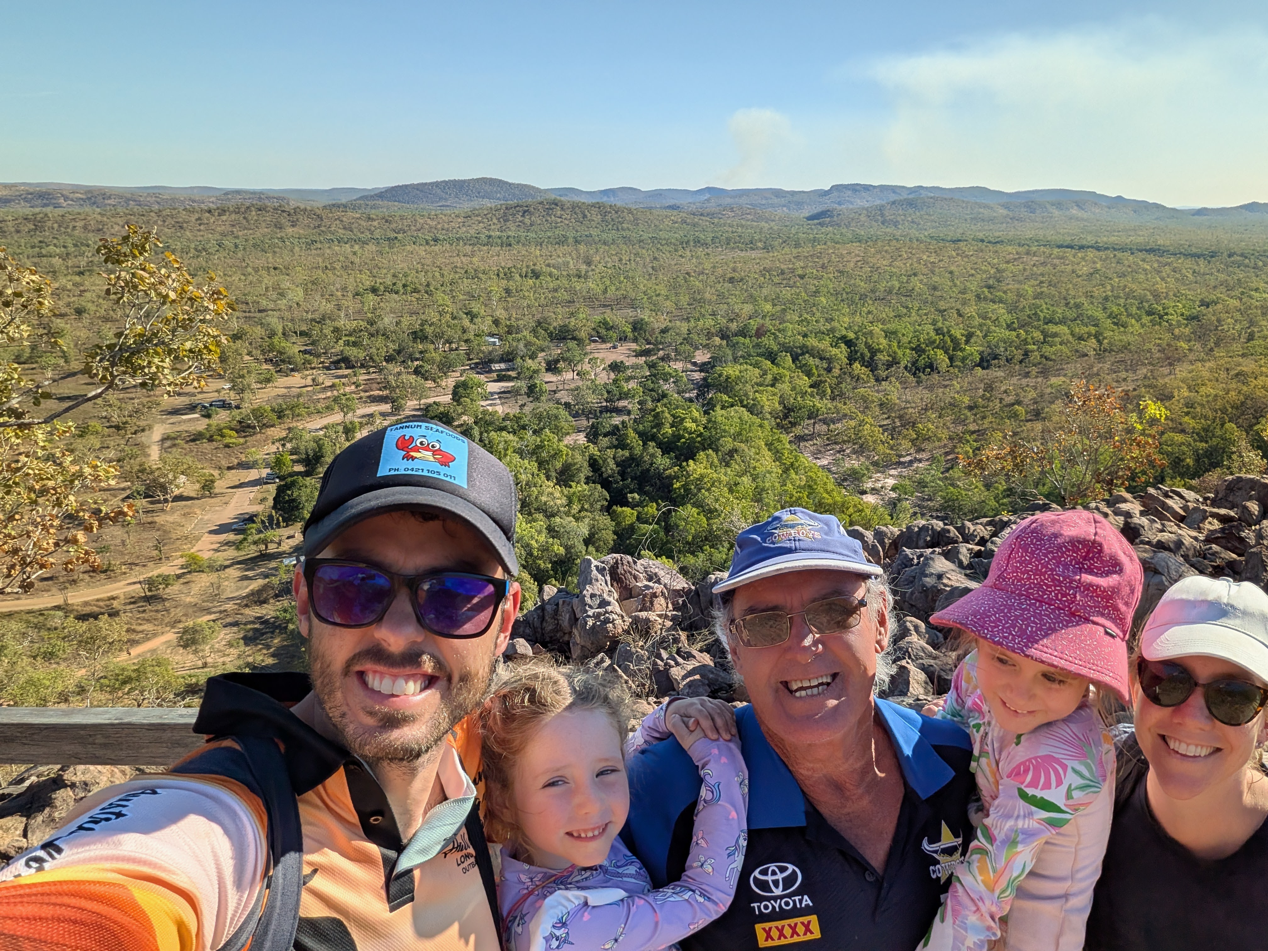 All five at the lookout above the Gunlom campground, bushfire smoke on the horizon