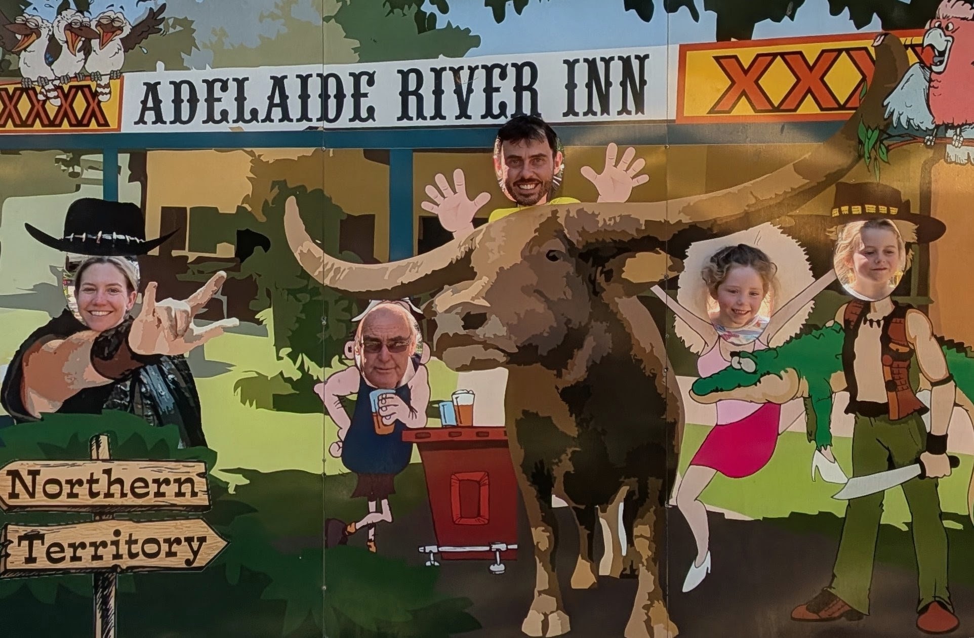 All five of us committing fully to the Adelaide River Inn&rsquo;s face-cutout board
