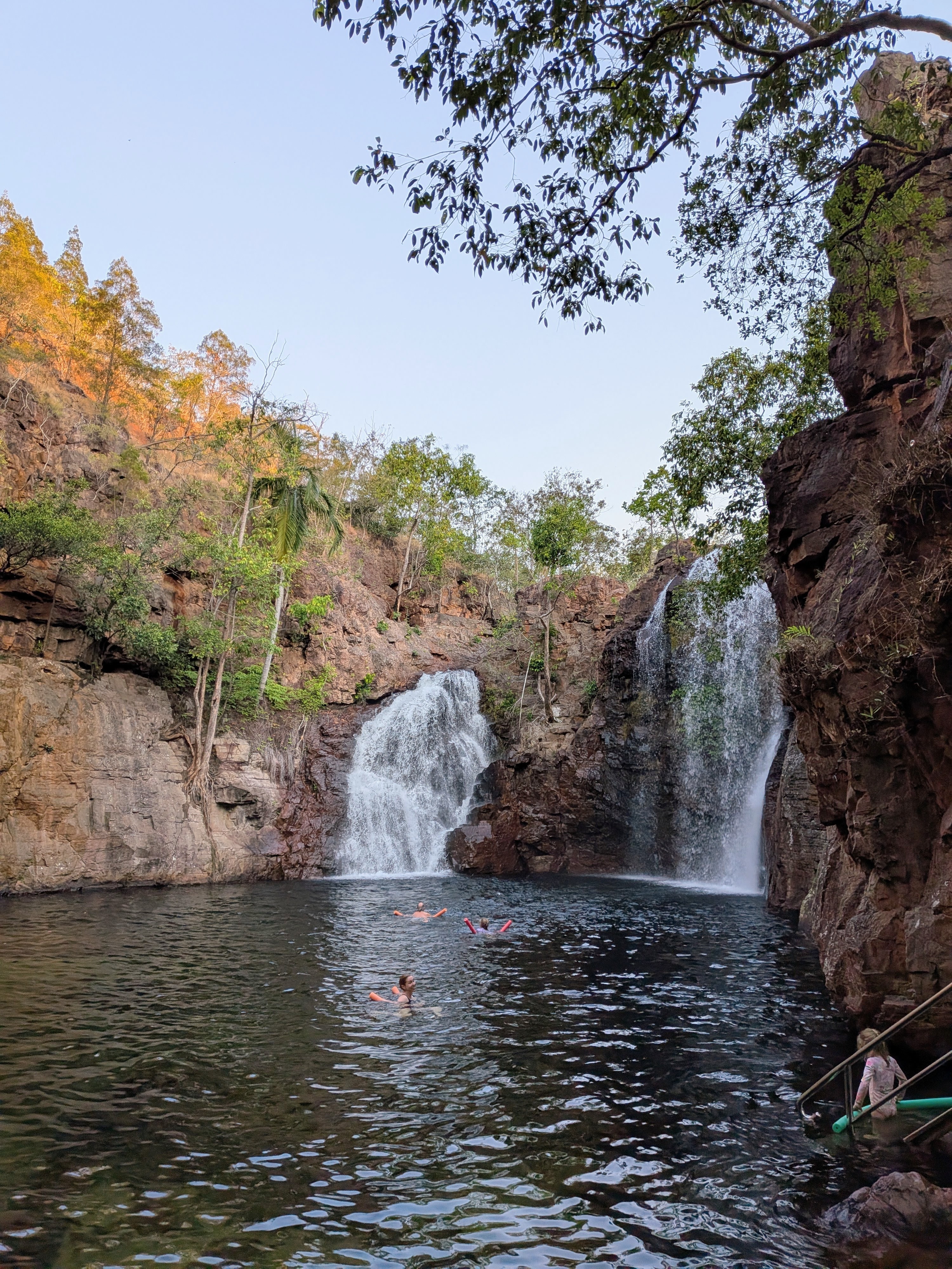 Dusk swim in the Florence Falls plunge pool, both falls still running