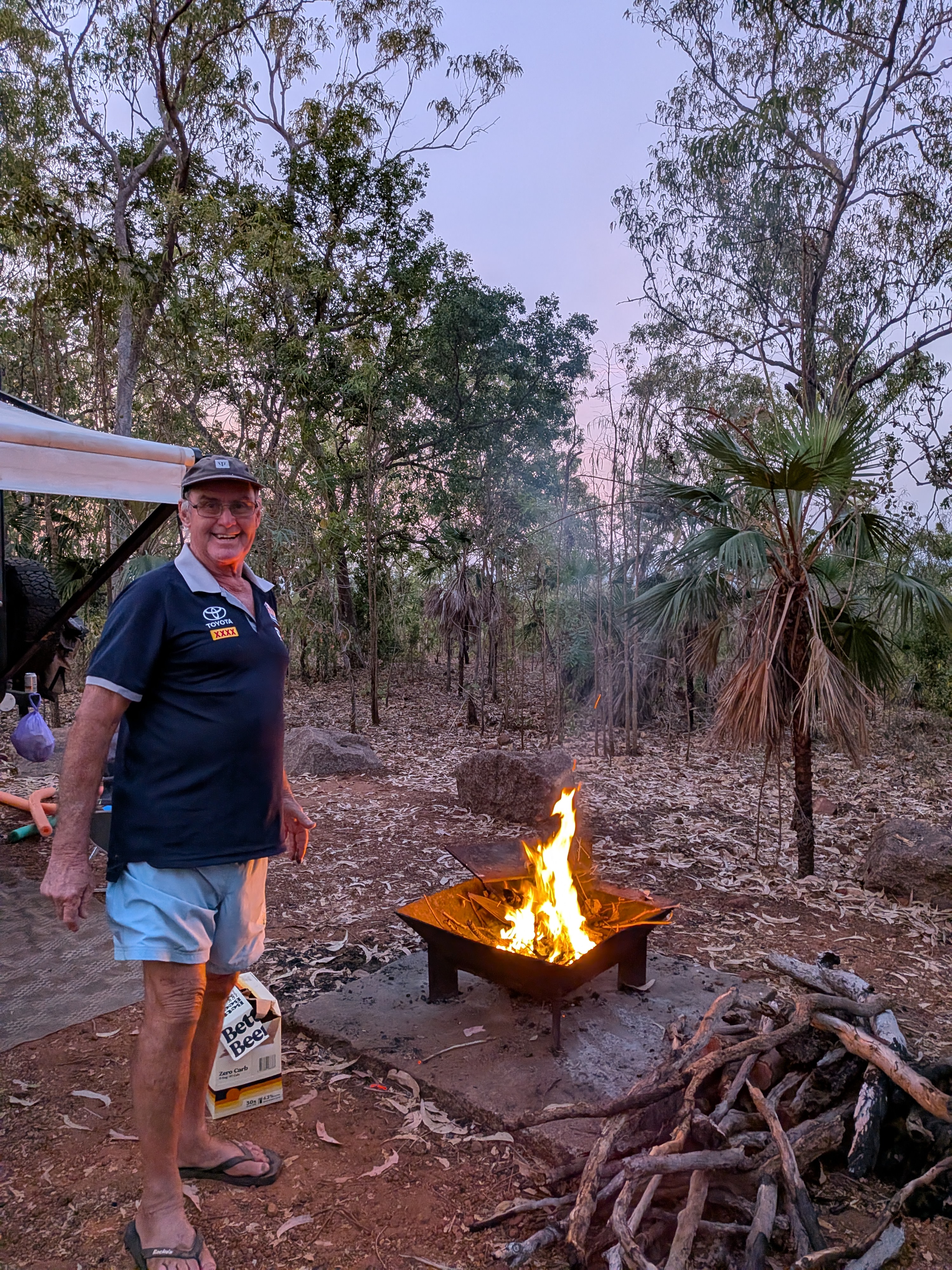 Pa tending a very respectable fire at our Florence Falls camp