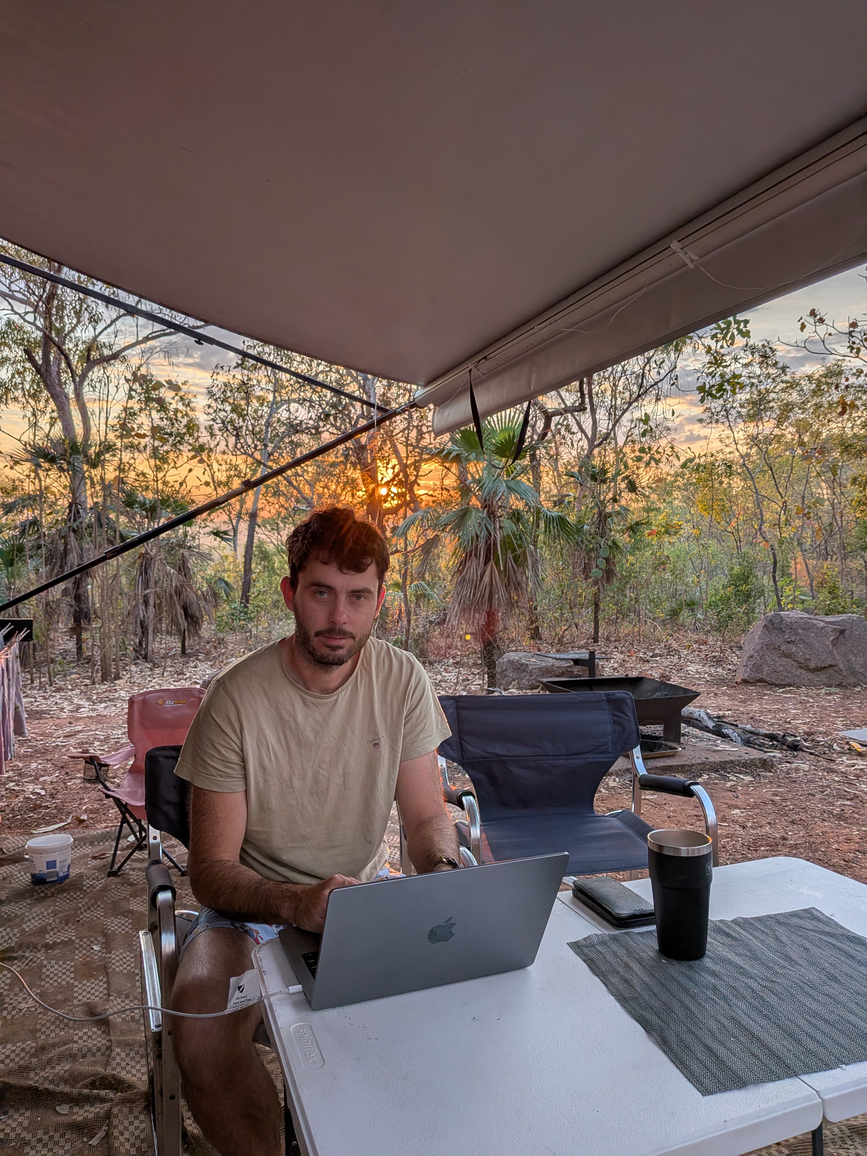 Dylan squeezing in some sunrise work under the awning