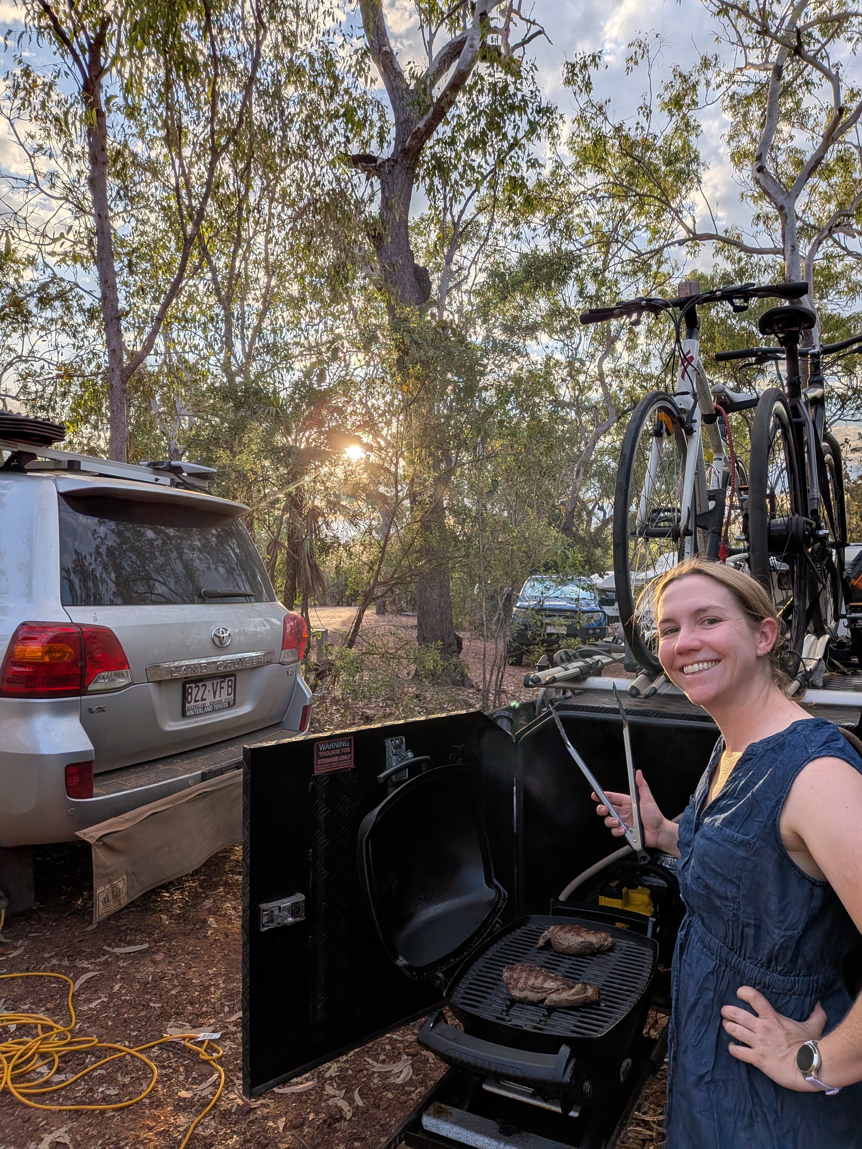 Erin and a fully functioning BBQ &mdash; steaks to celebrate