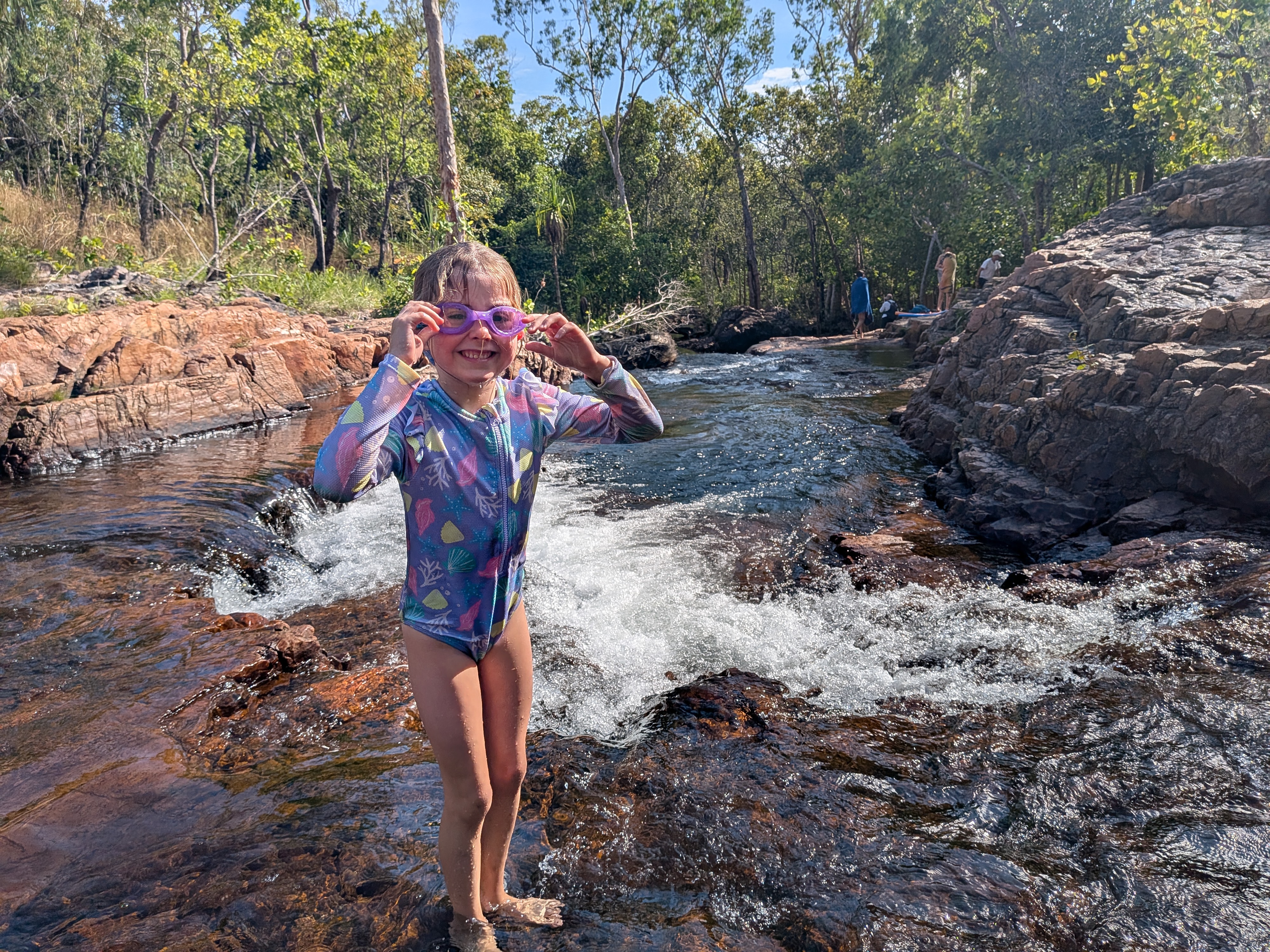 Hazel, goggles at the ready, mid-rapids at an empty Buley Rockhole