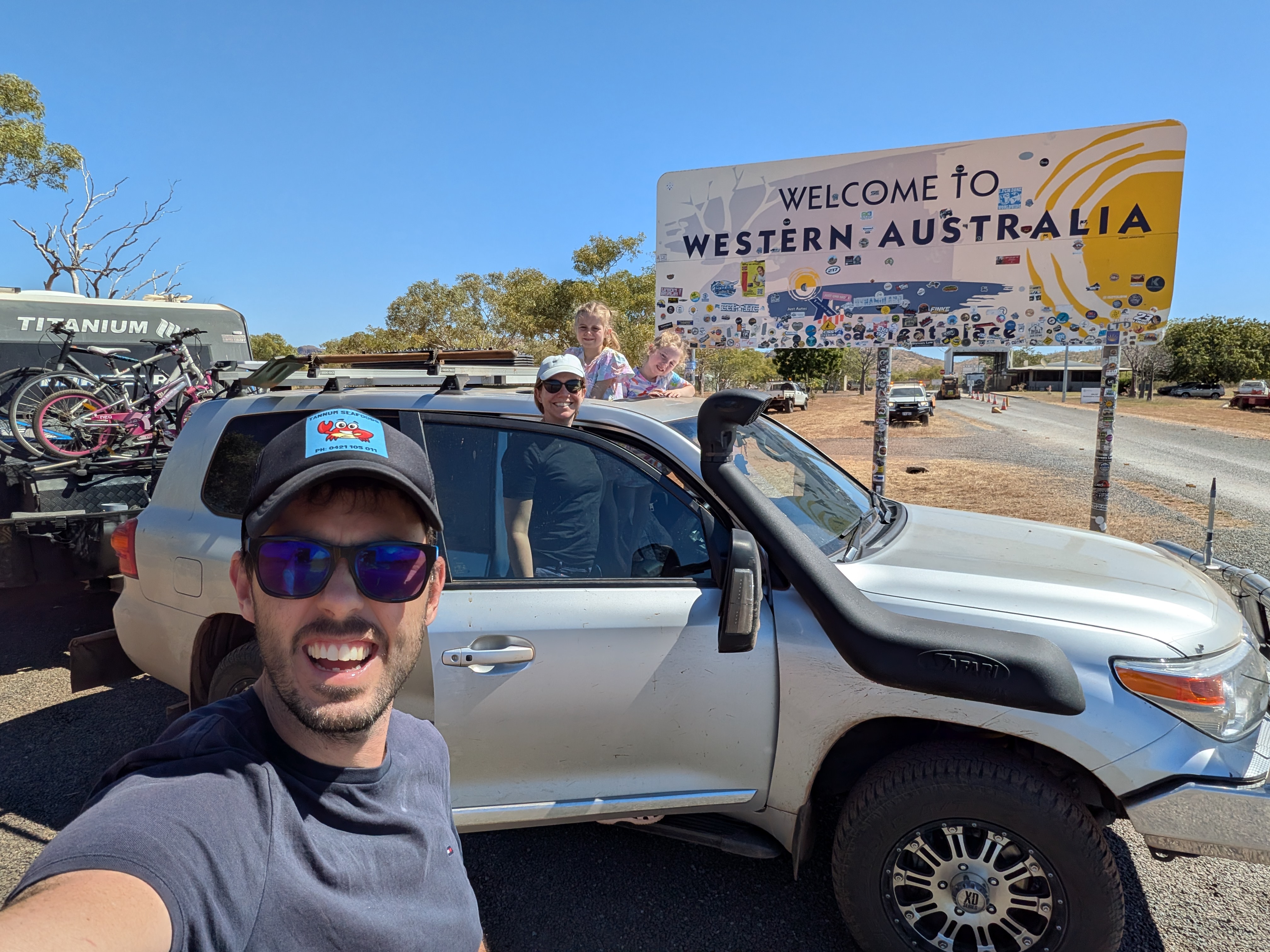 Border-crossing selfie &mdash; all four of us officially in Western Australia