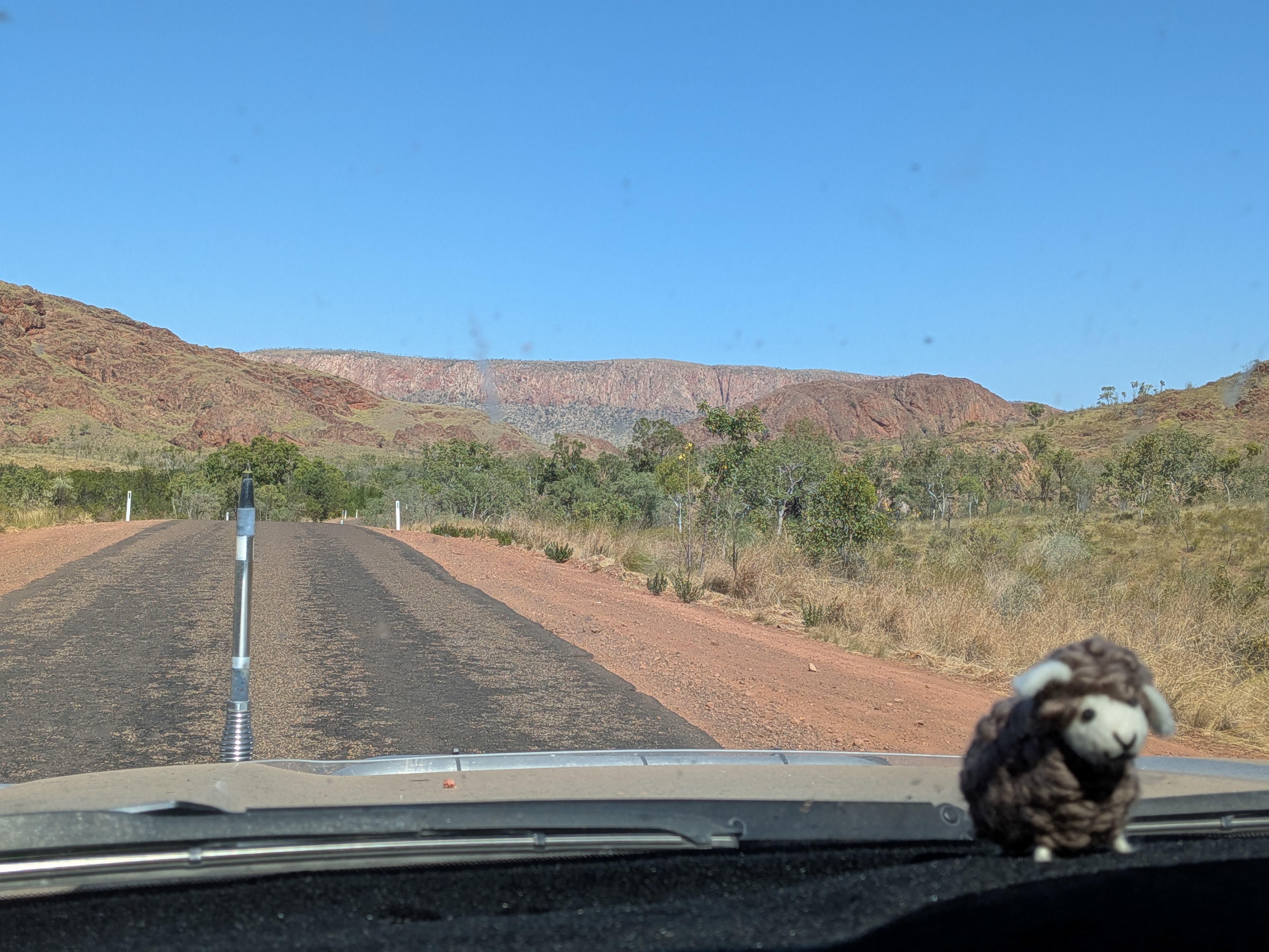 Winding through the rust-red ridges of the Carr Boyd Ranges on the way in to Lake Argyle