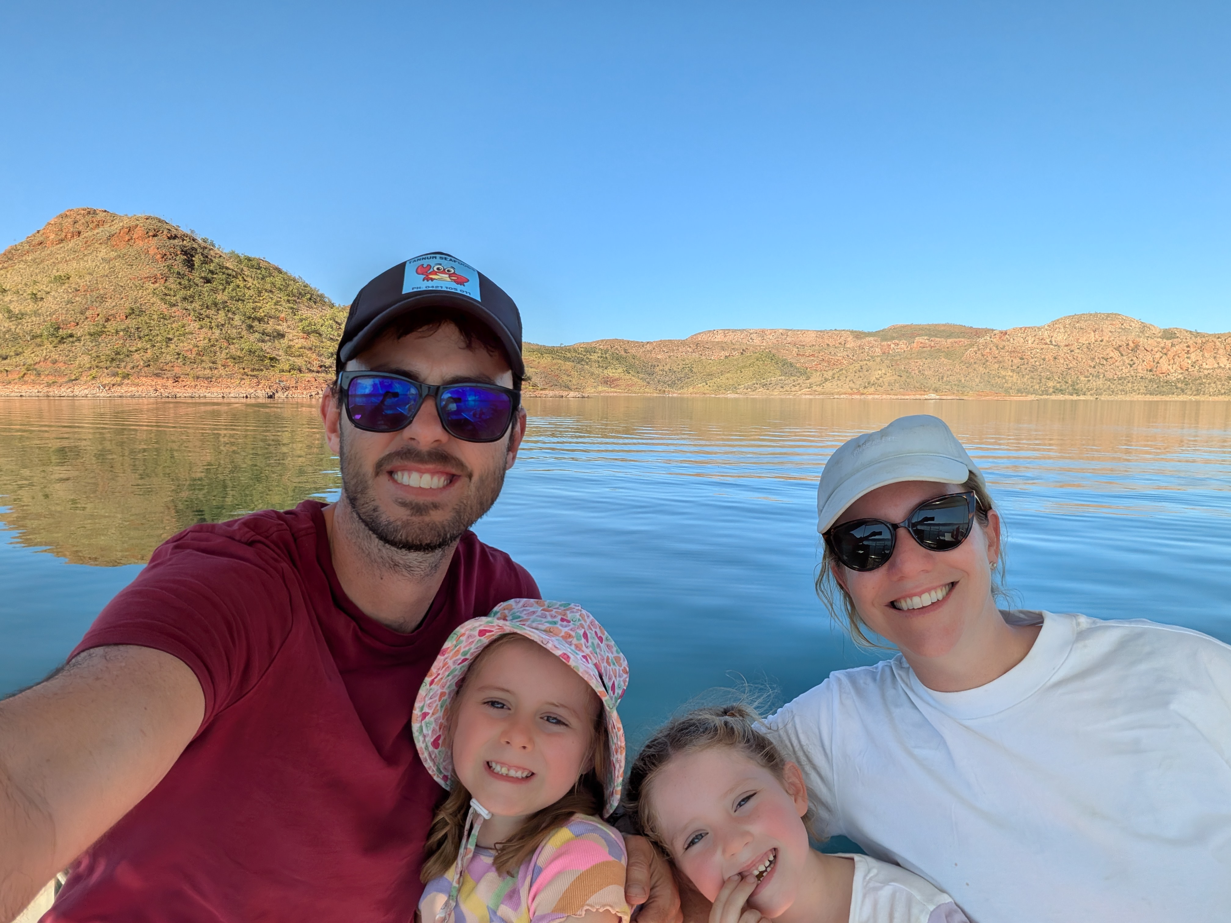 Glassy afternoon water and one last family selfie on the lake