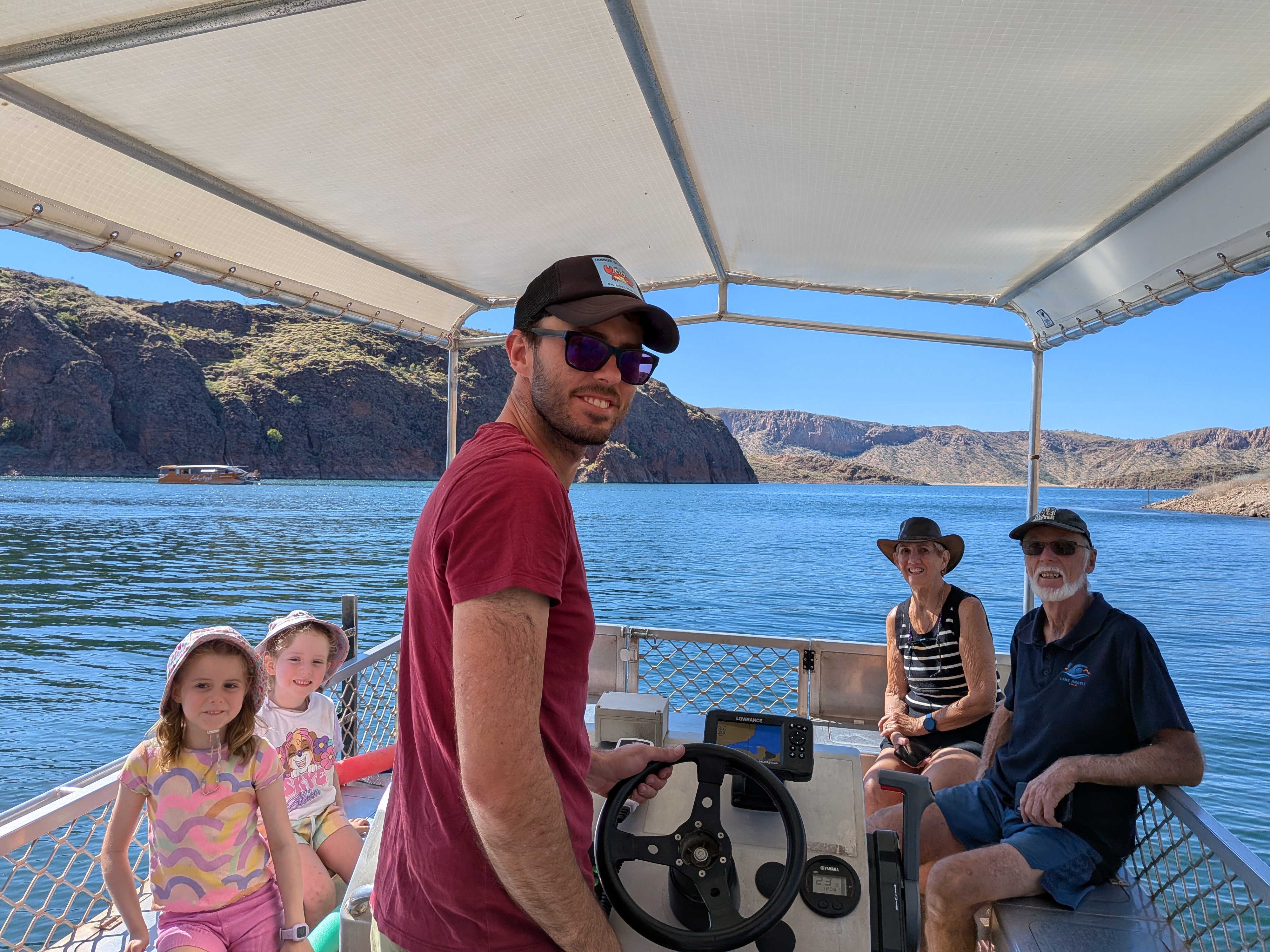 All aboard &mdash; Dylan at the helm, Gordon and Tricia settled in, deckhands at the ready