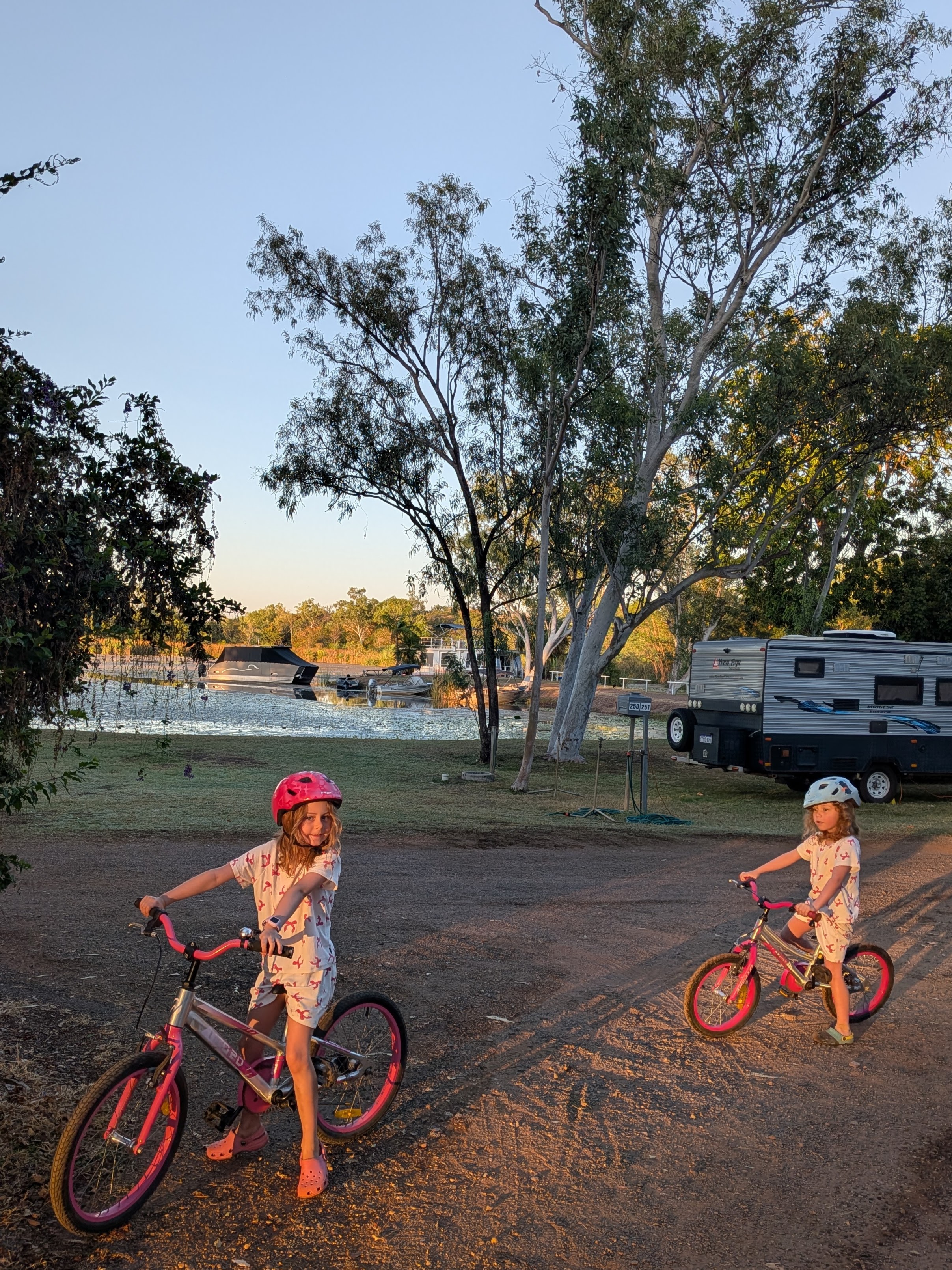 Sunday-morning bike laps in PJs &mdash; Hazel up front, Leah close behind