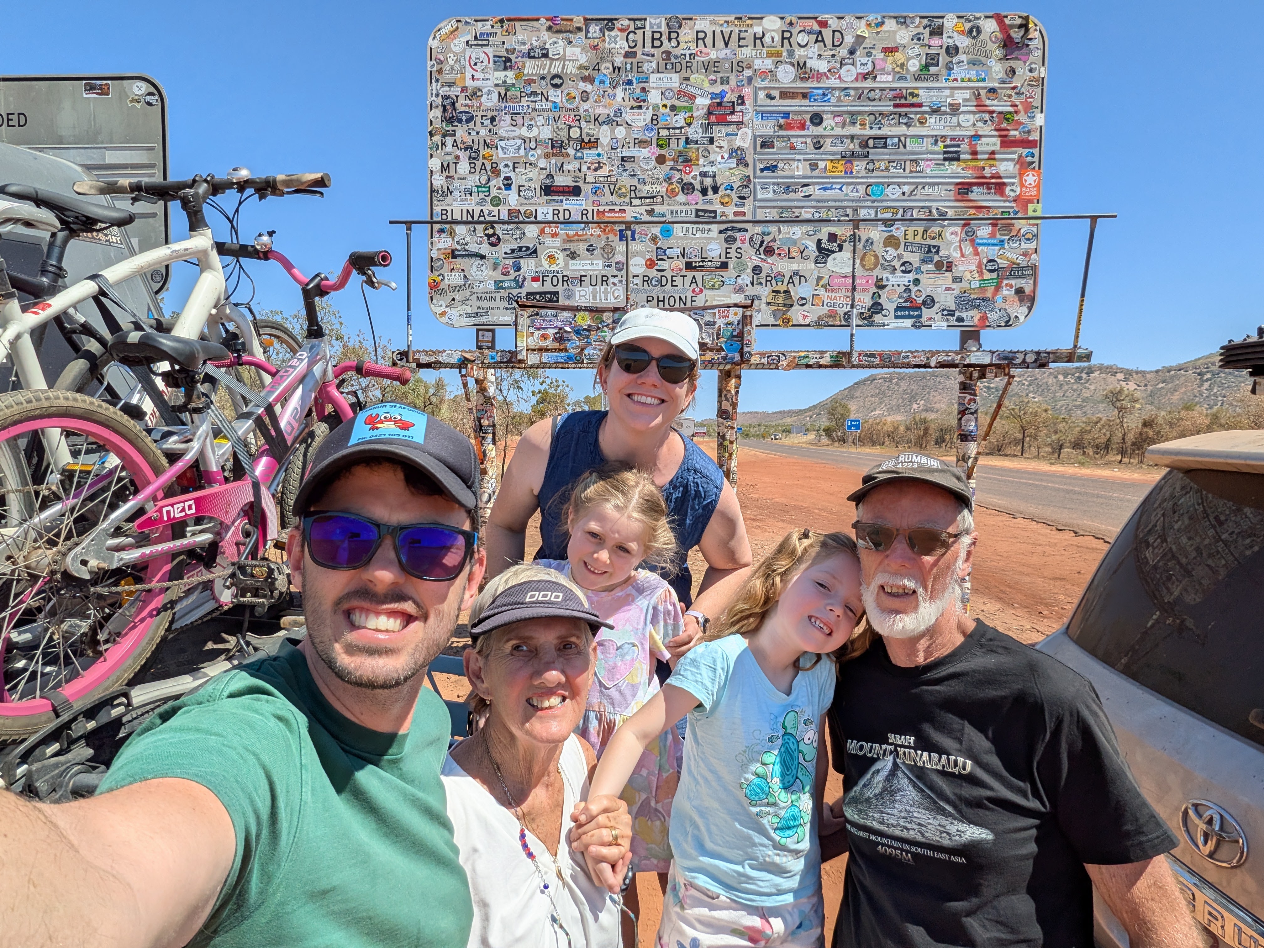 All six of us at the Gibb River Road sign, ready for the adventure