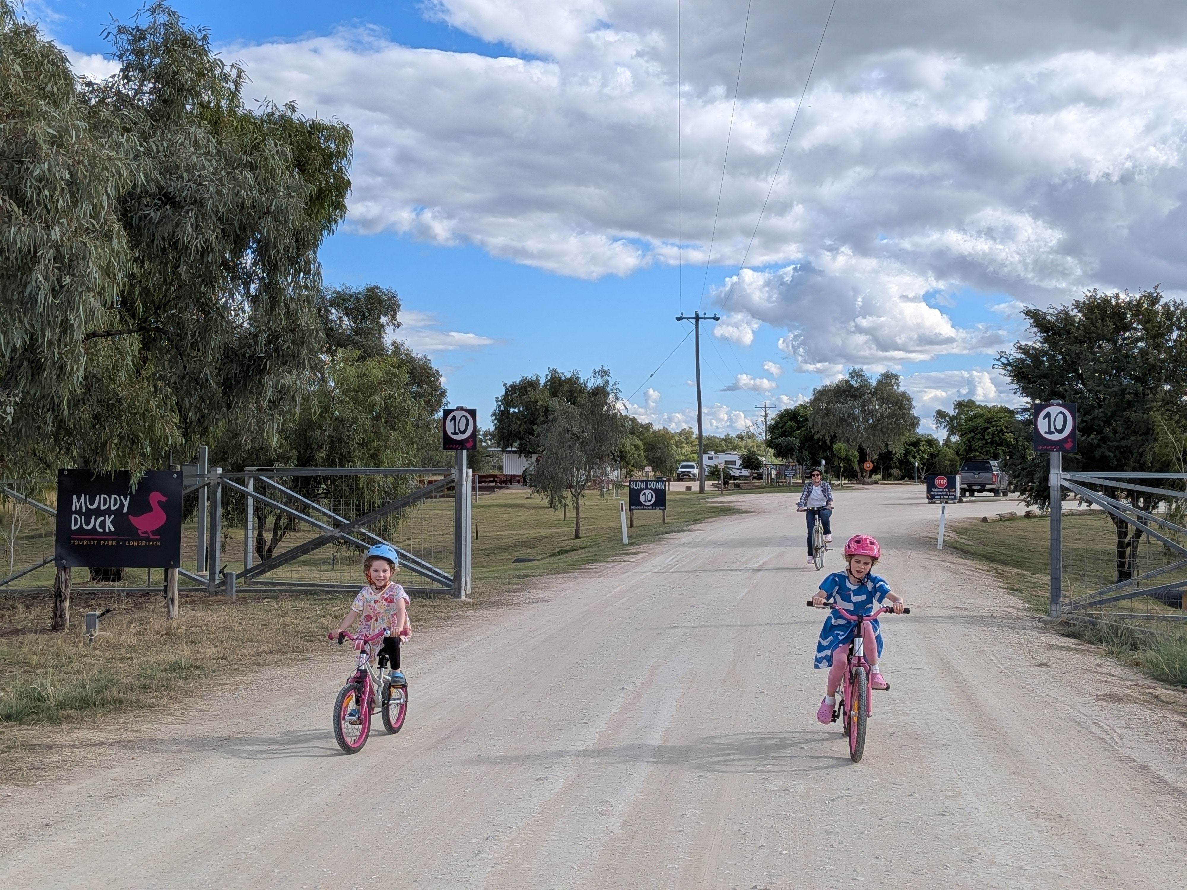The girls bike riding at the Muddy Duck Caravan Park