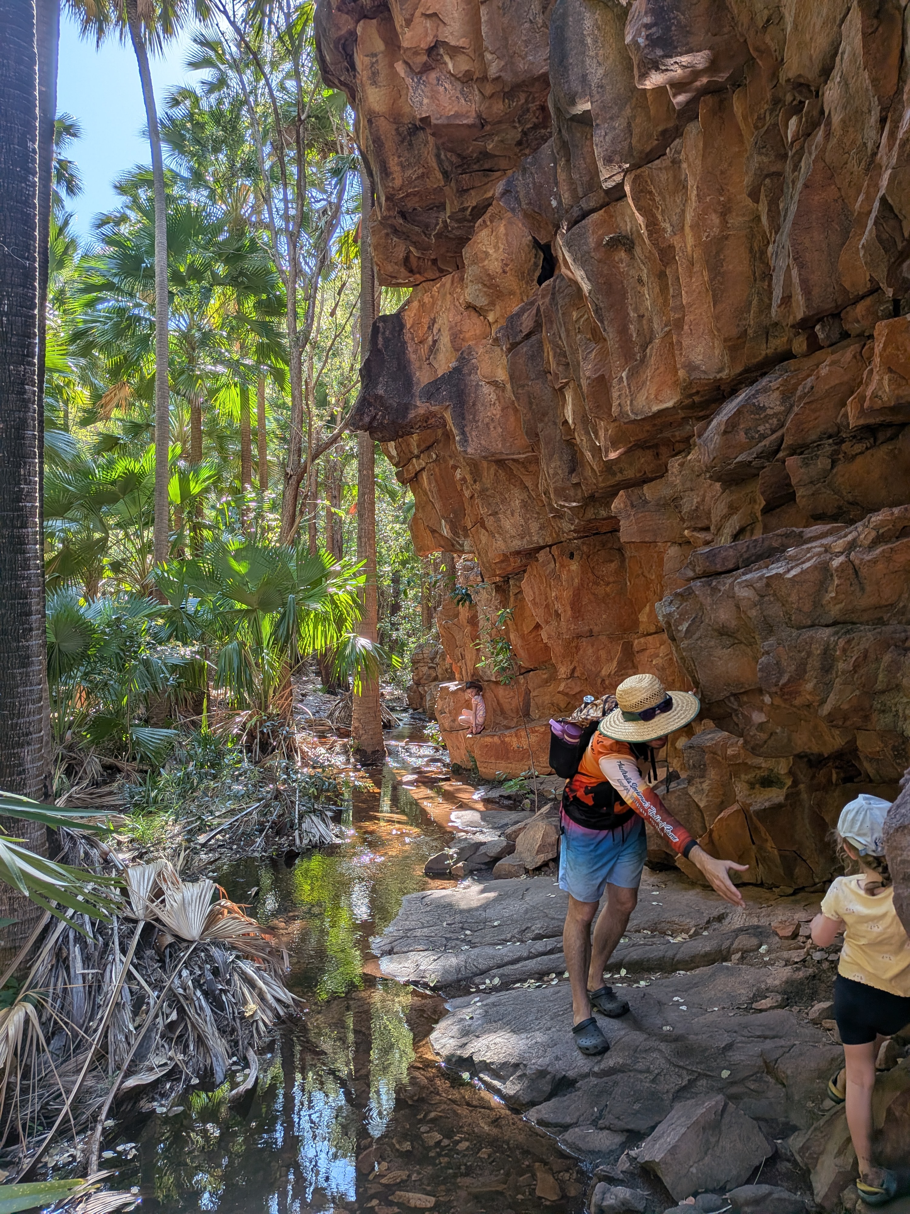 A helping hand from Dylan for Leah, Hazel tucked into a rock nook