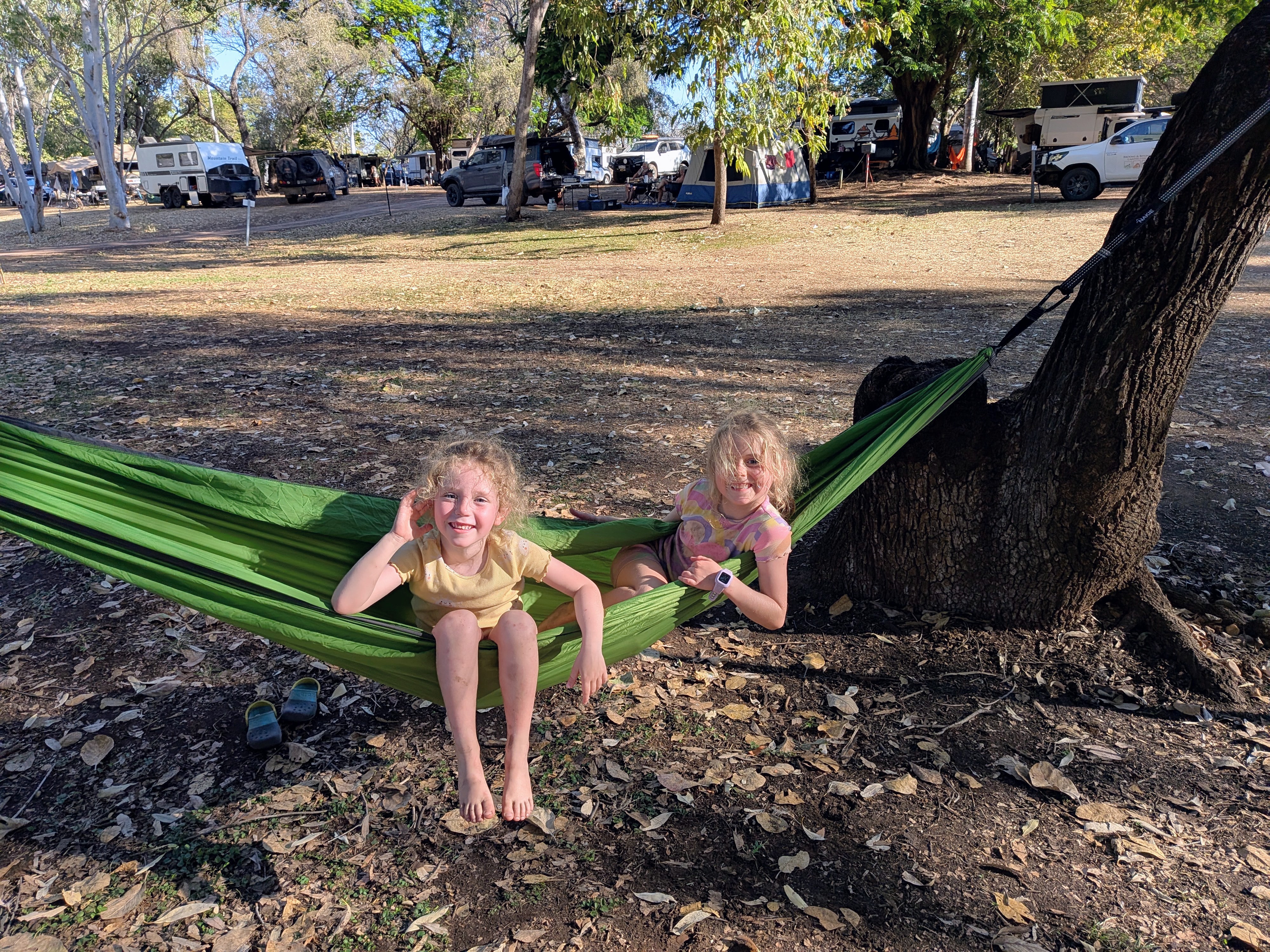 Post-hike recovery &mdash; the girls sharing the green hammock