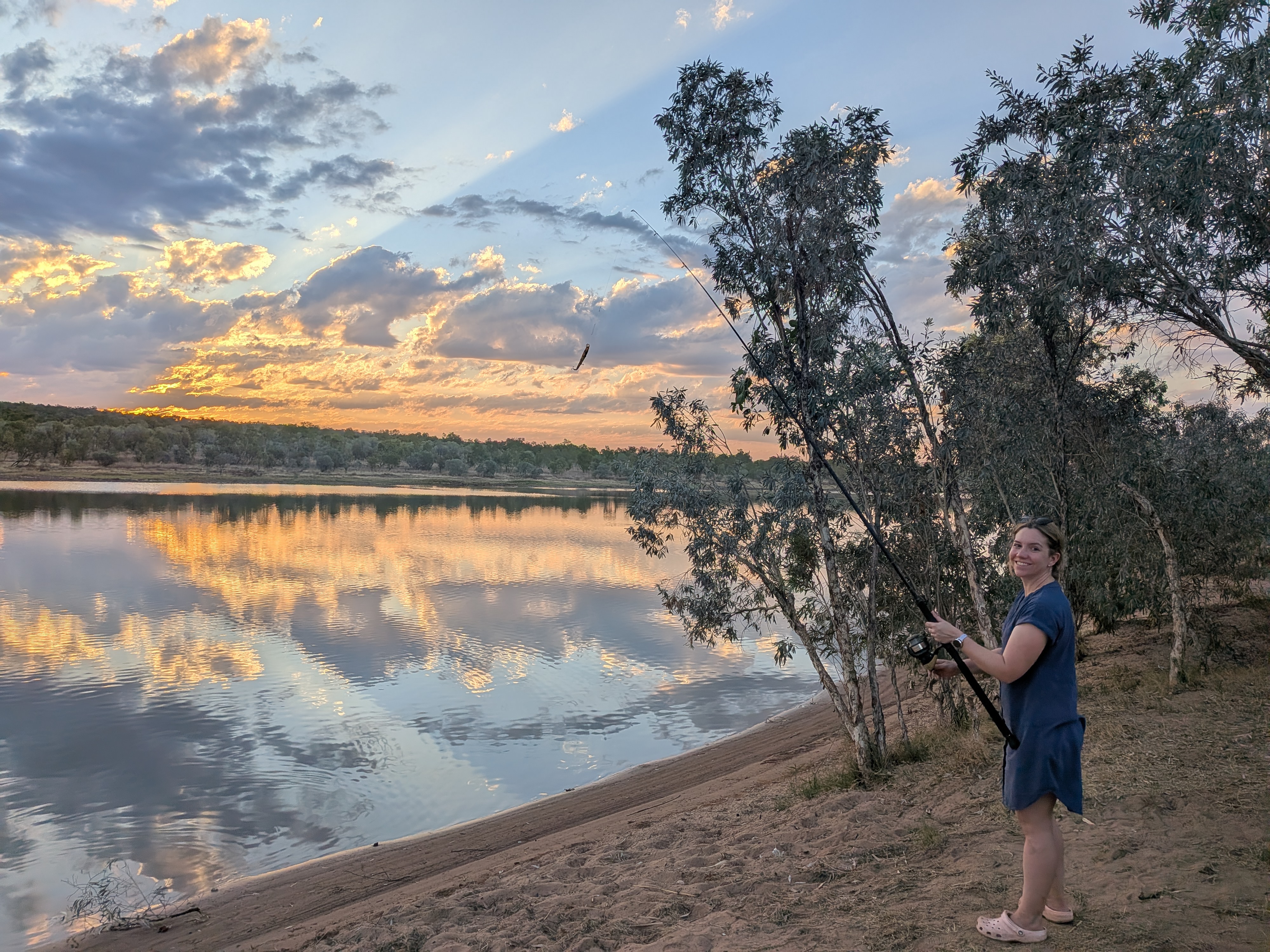 Erin having a cast as the sun drops