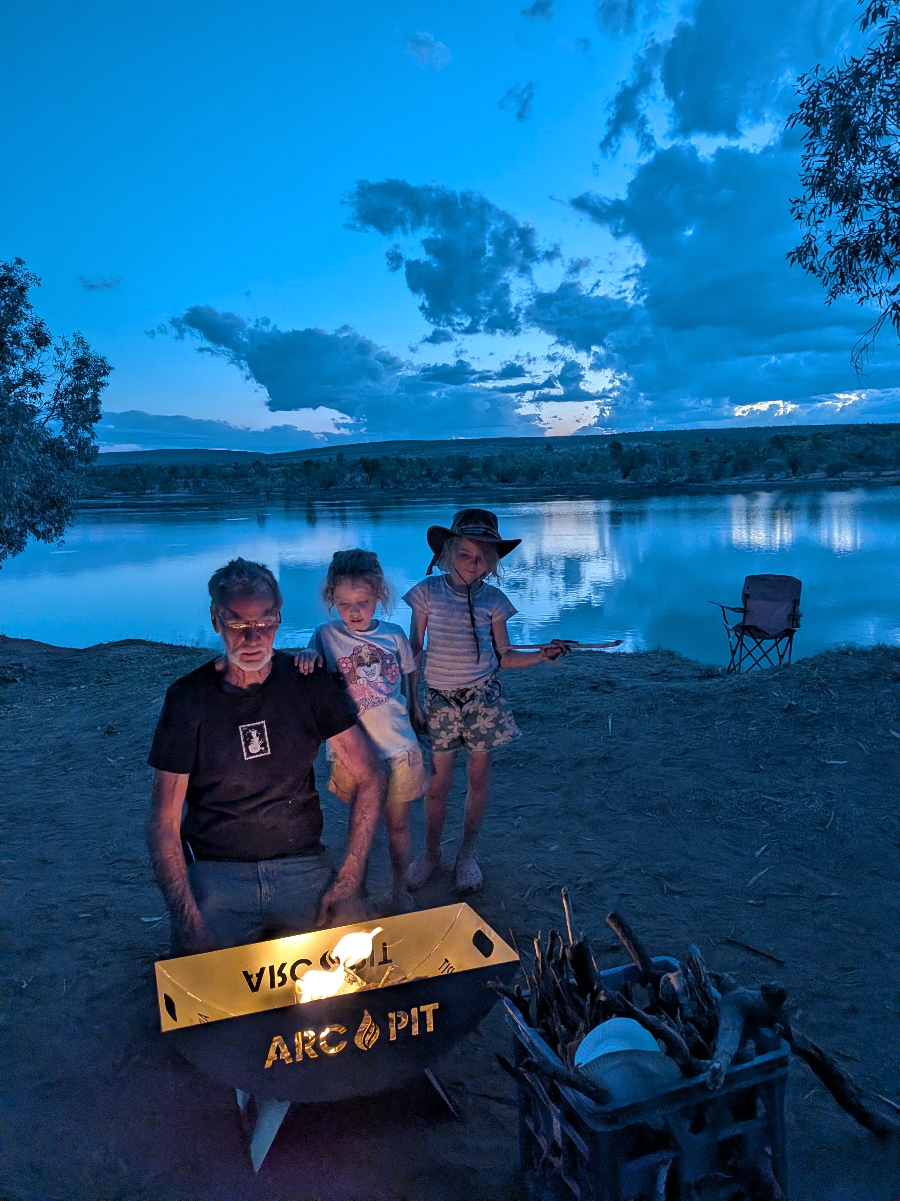 Christening the Arc Pit &mdash; Gordon and the girls getting the fire going