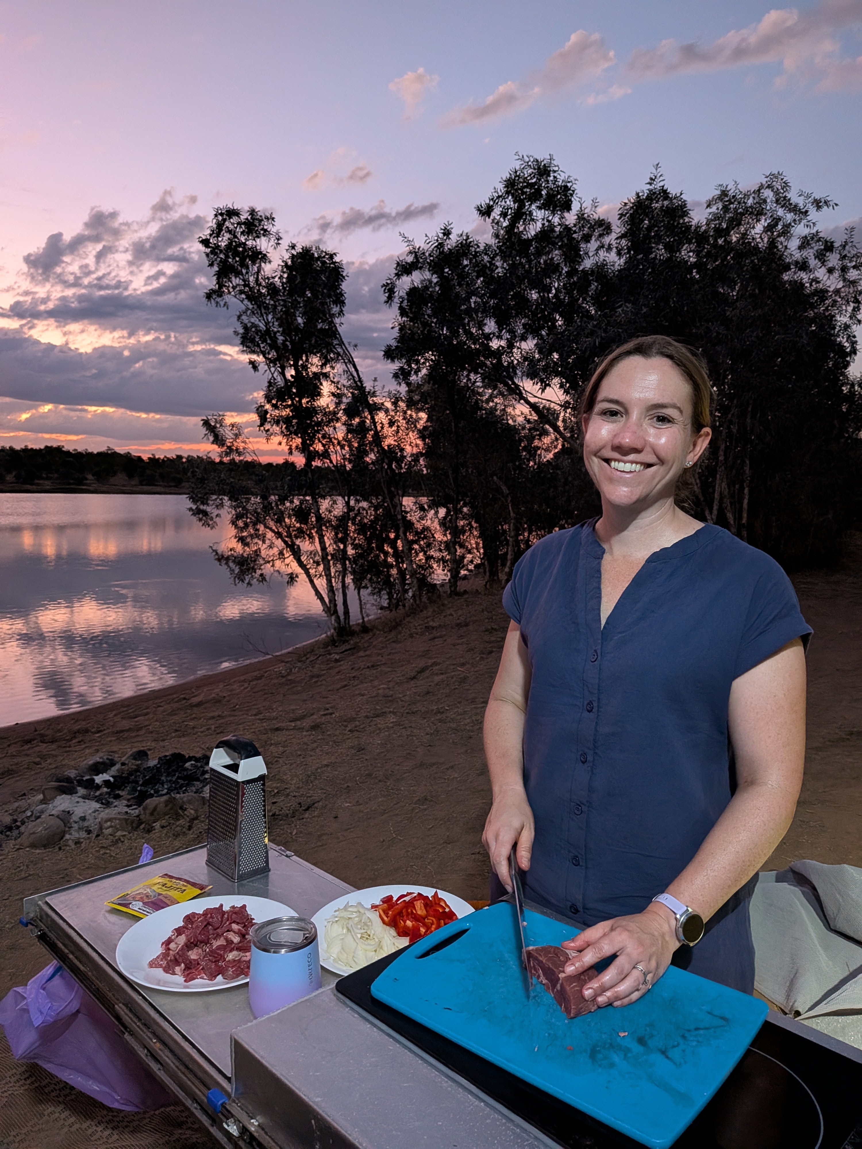 Fajitas on the camp kitchen as the sky goes pink
