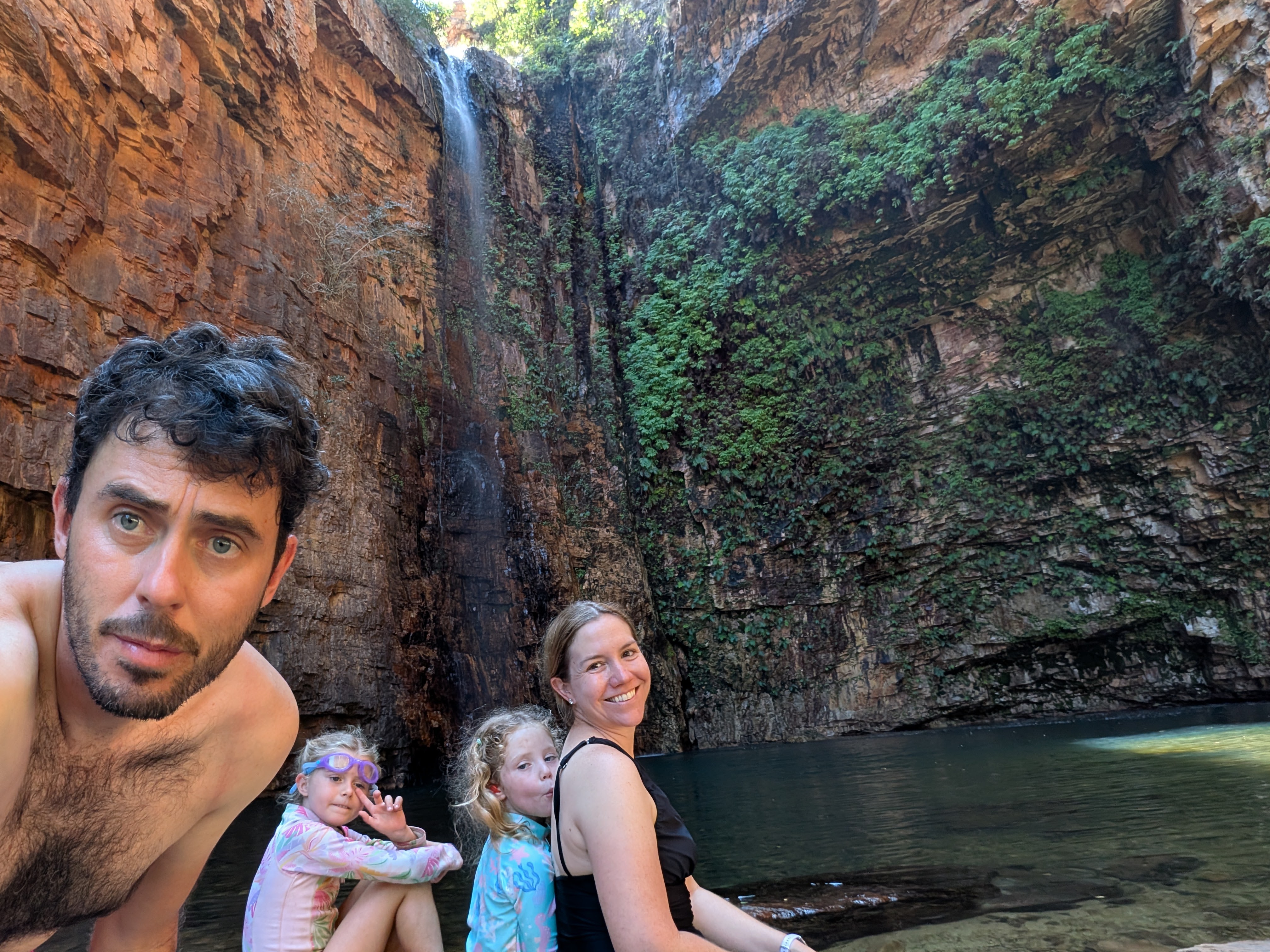 Swim survivors &mdash; family selfie in front of the falls