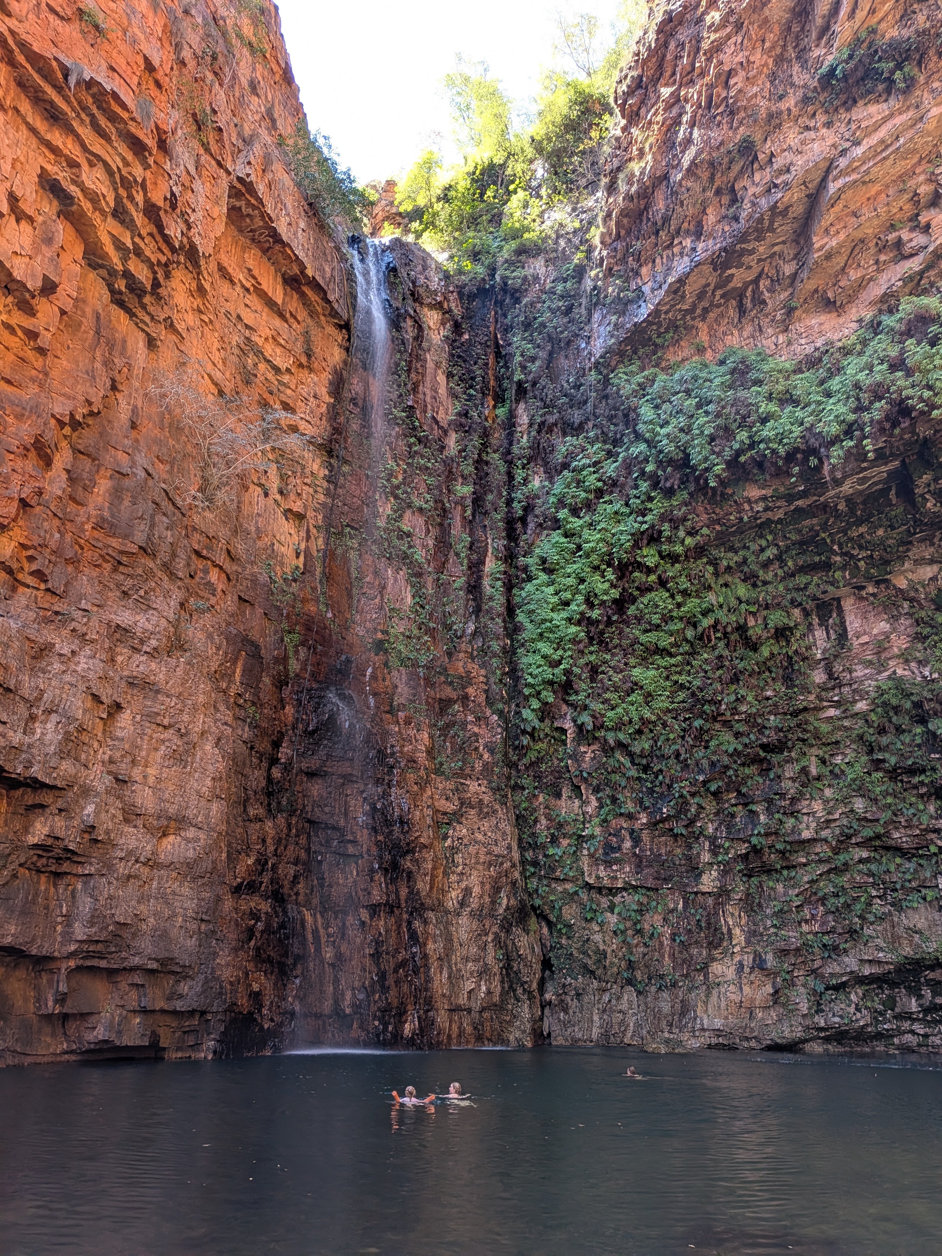 Spot Erin &mdash; out behind the waterfall, arms up