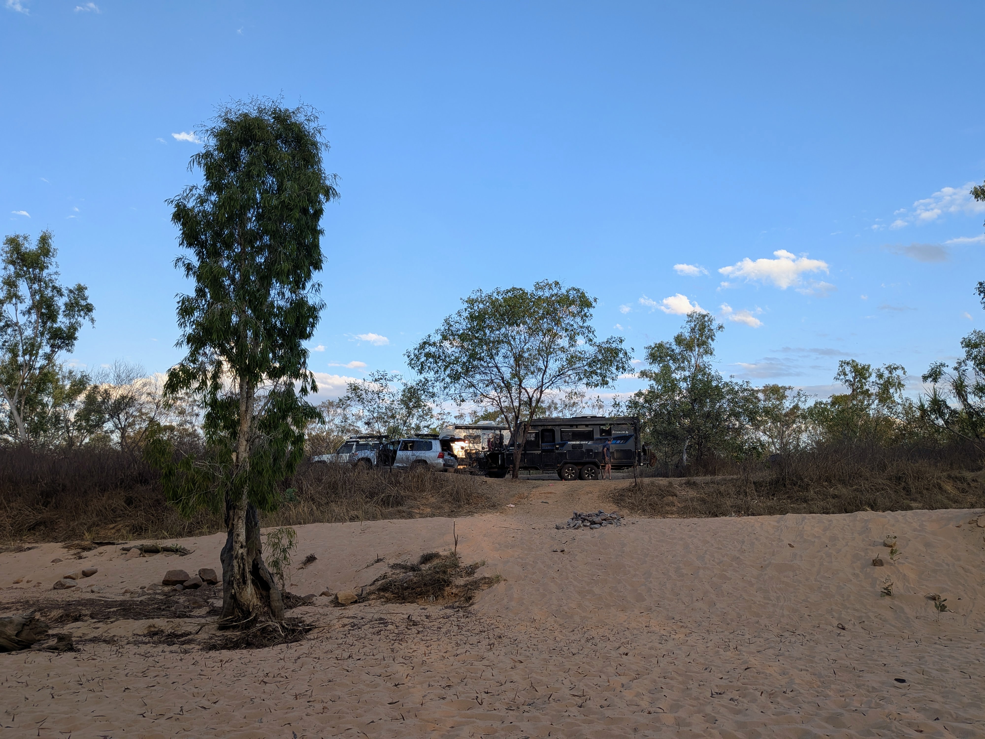 First look at the private beach &mdash; vans tucked up on the bank