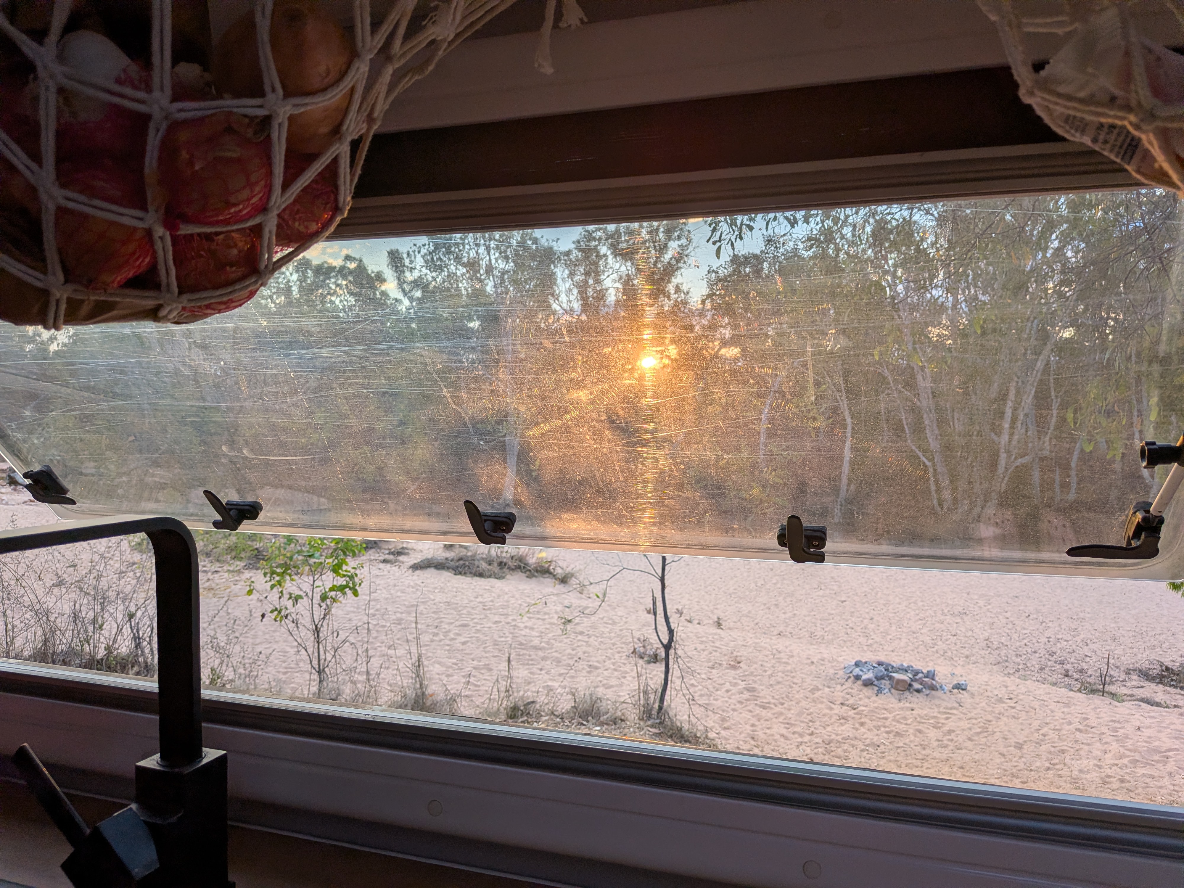Day one done &mdash; sunset over our beach from the van window