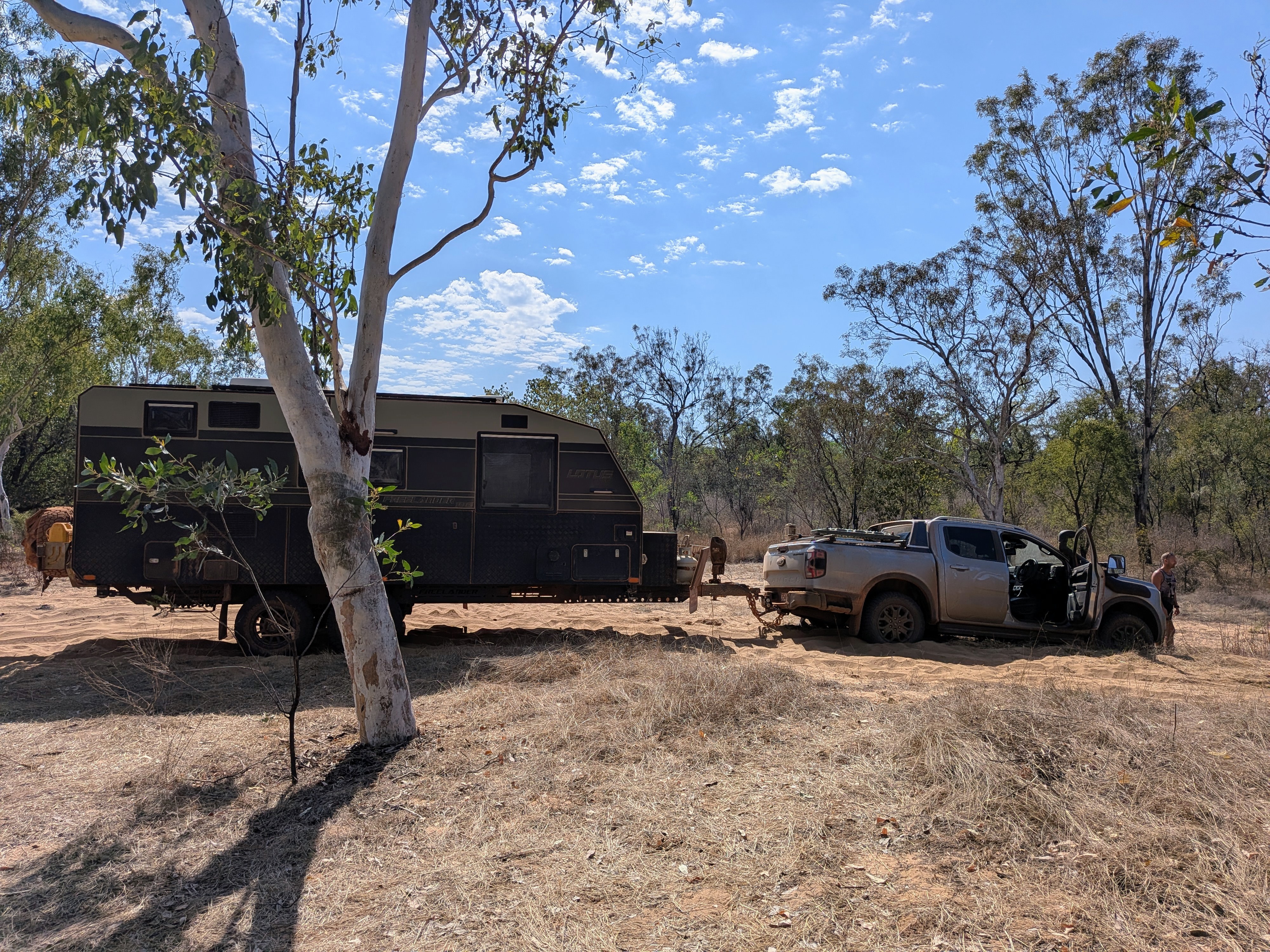 The neighbours&rsquo; rig, well and truly bogged in the soft sand