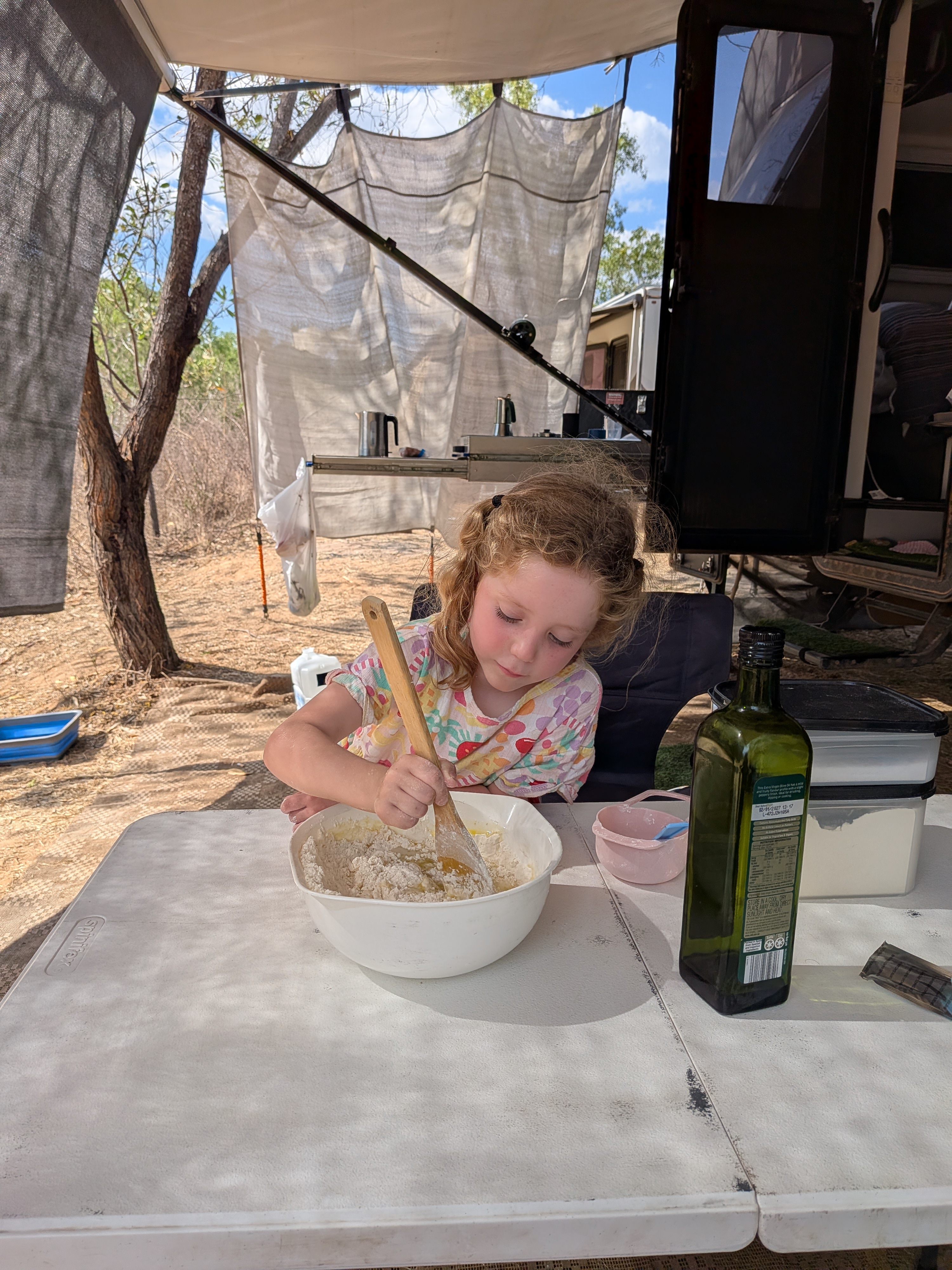 Leah on dough duty for the bread rolls