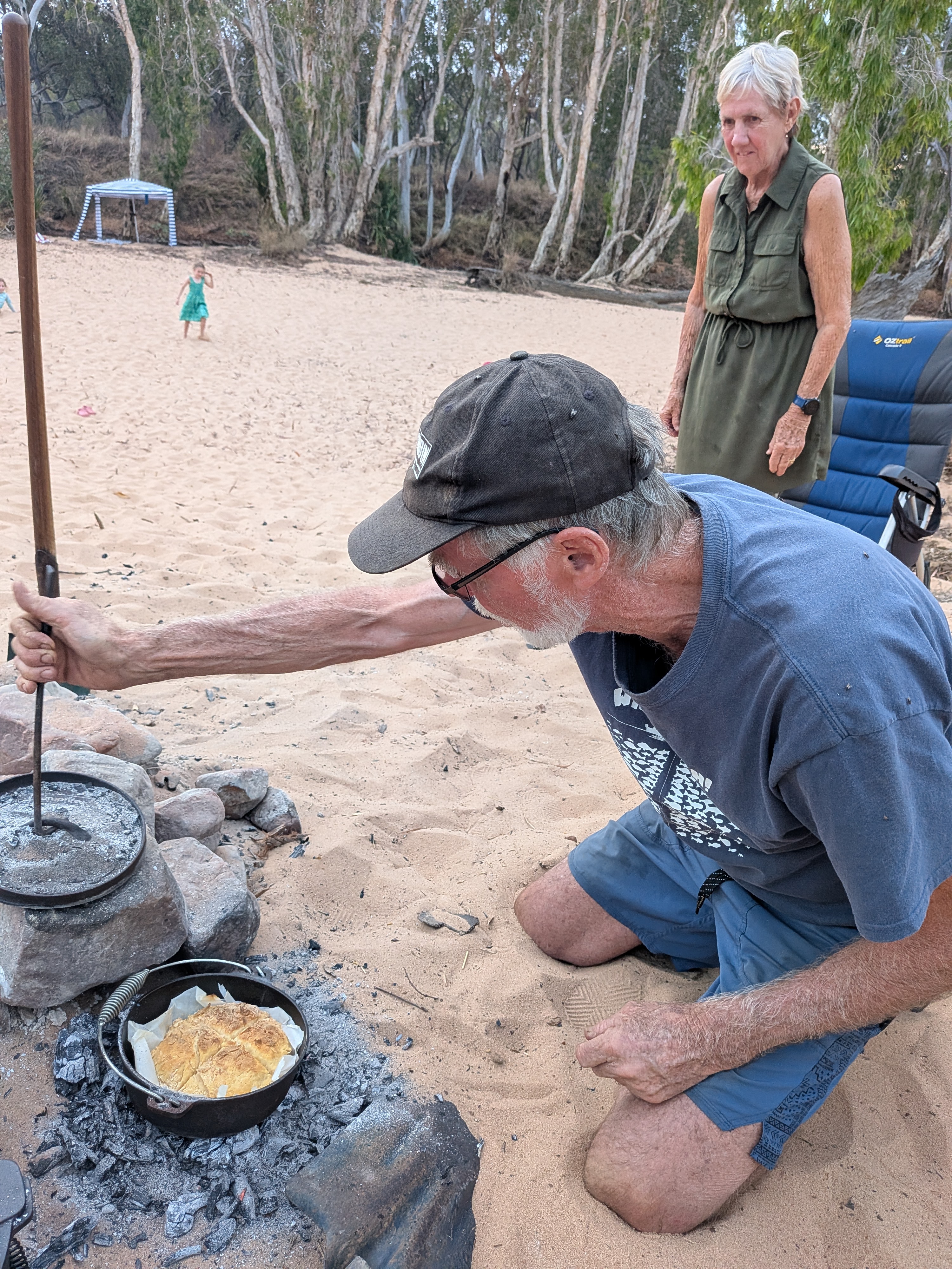 Gordon checks the coals &mdash; golden on top