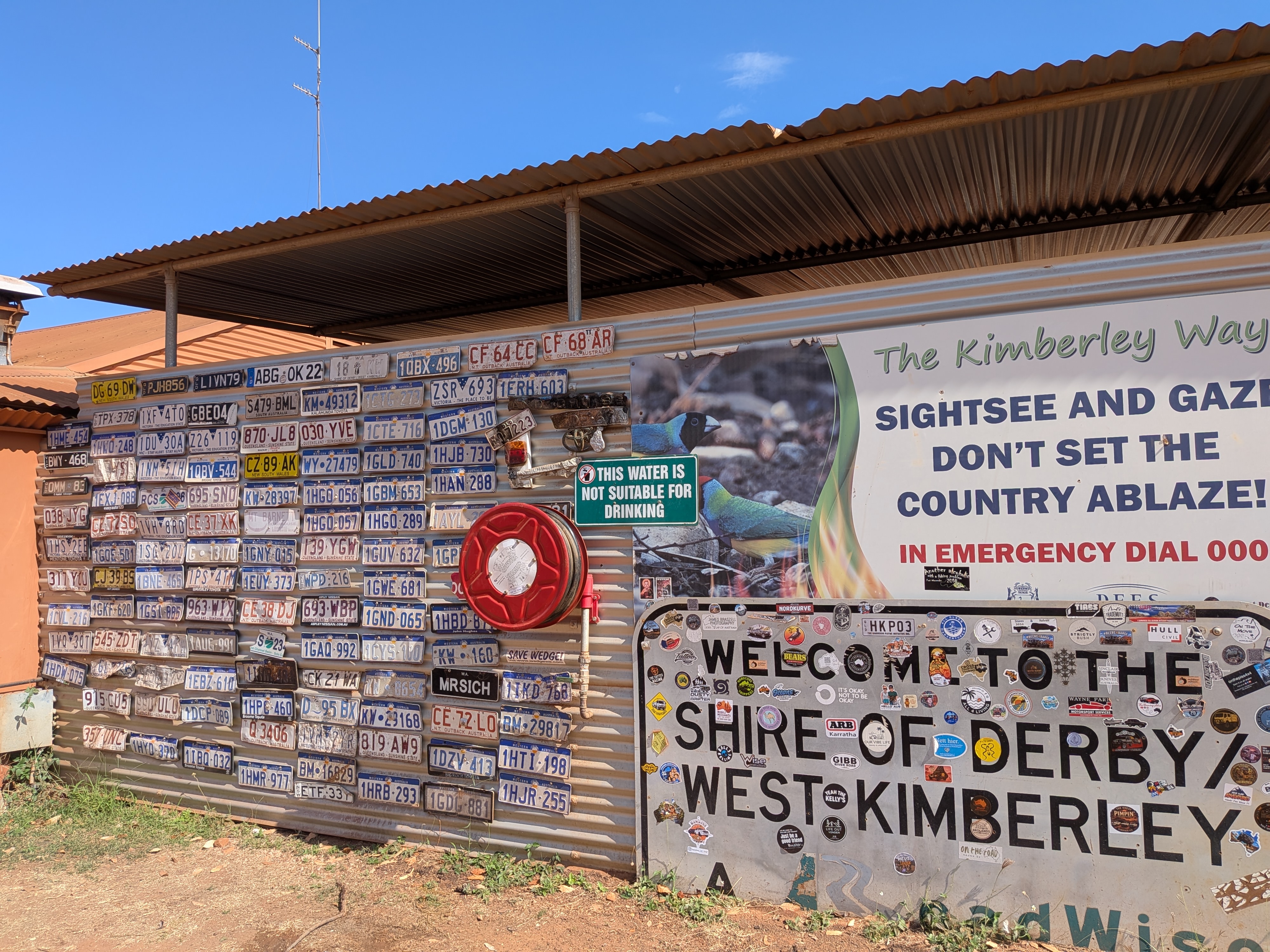 The Mt Barnett Roadhouse number-plate wall &mdash; first shop since Kununurra