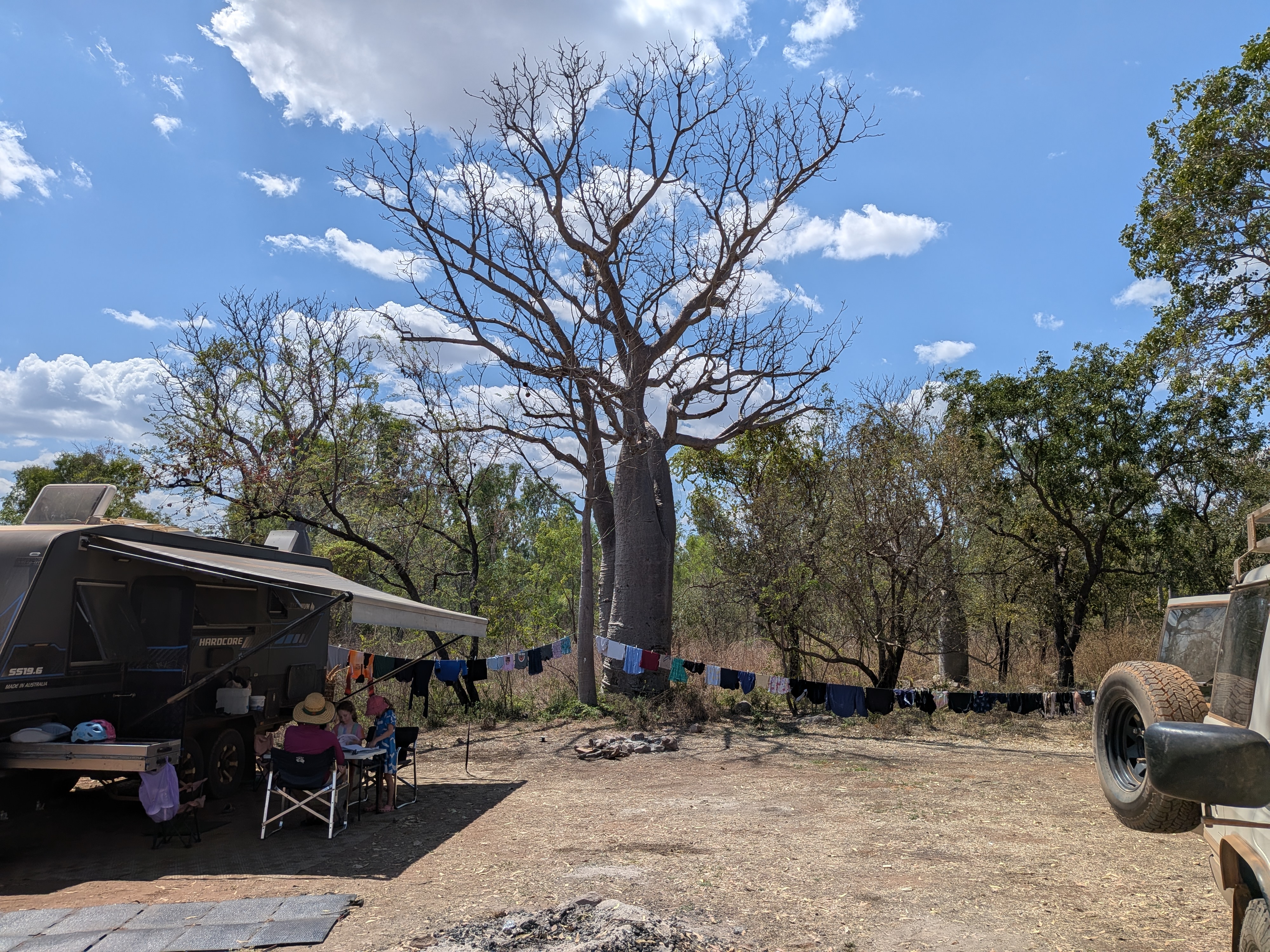 Camp under the big boab, the bucket-washed load drying on the line