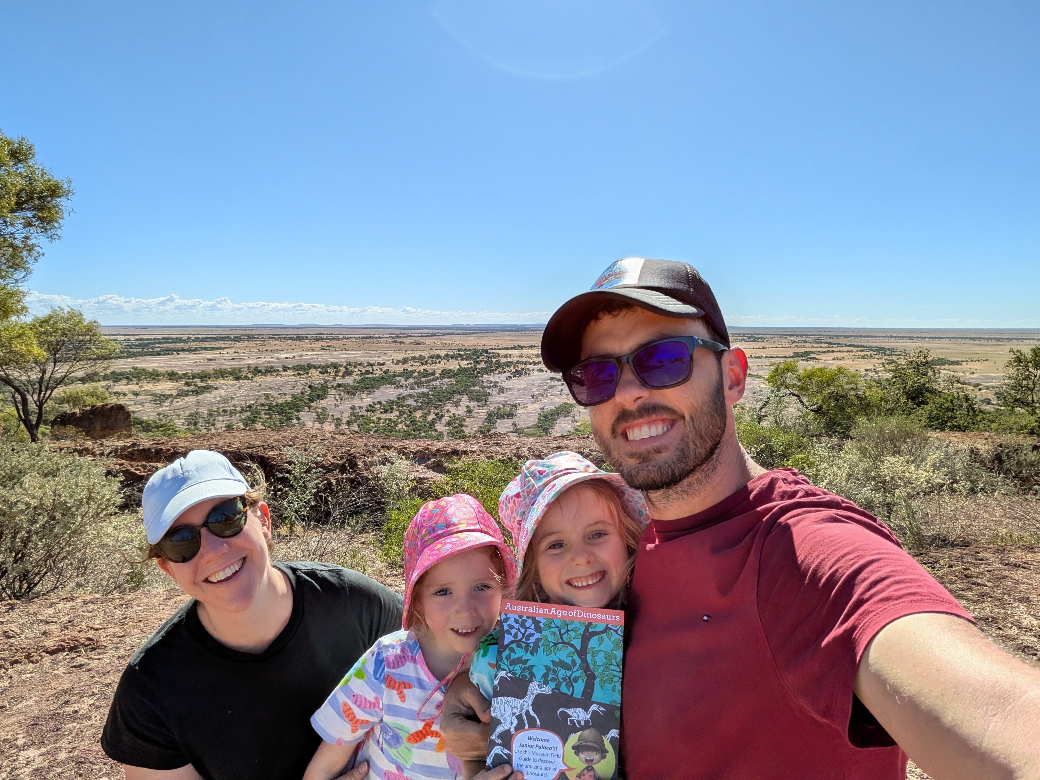Family selfie at the Australian Age of Dinosaurs lookout over the outback plains