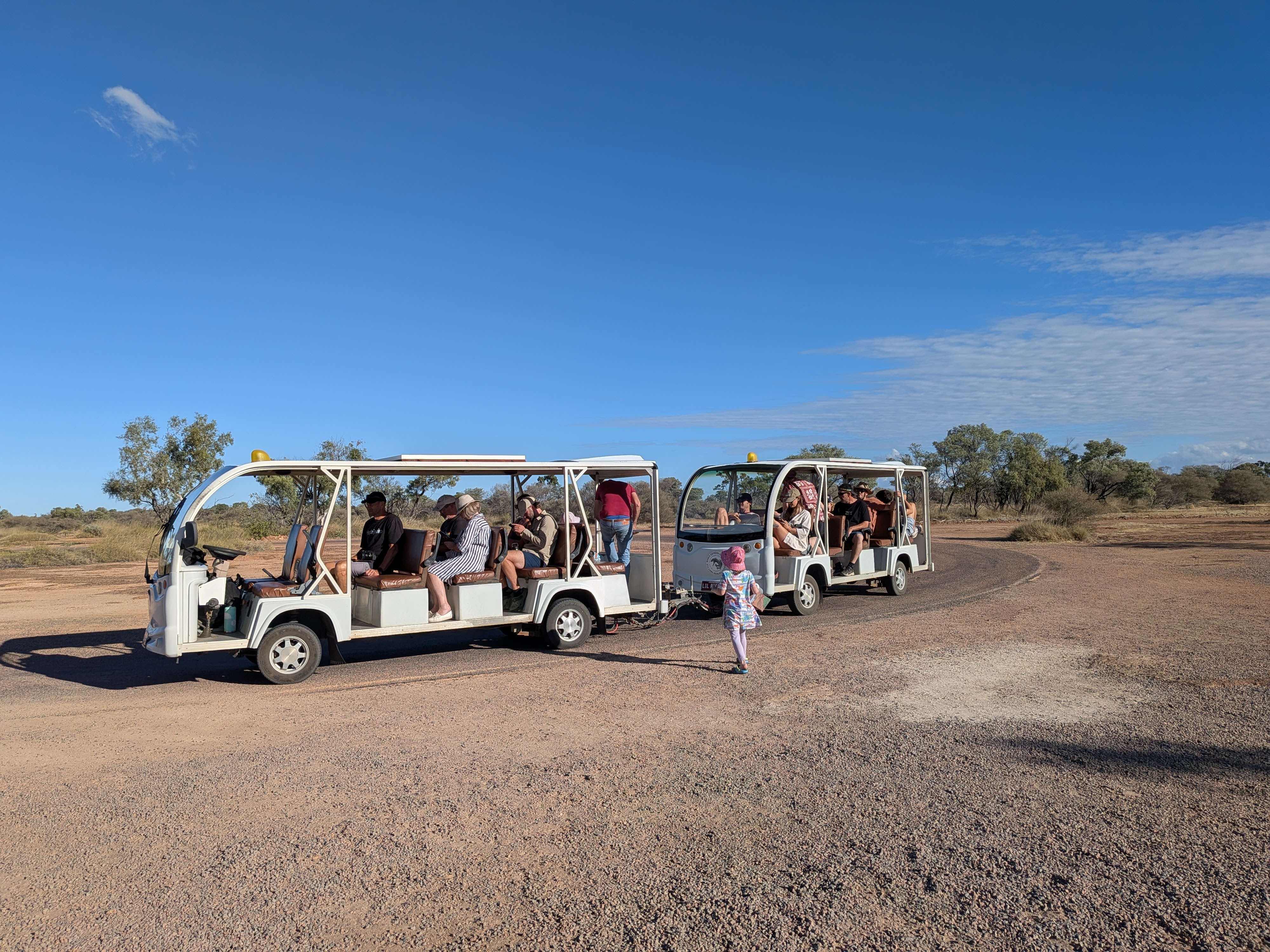 The museum tram heading out across the red dirt