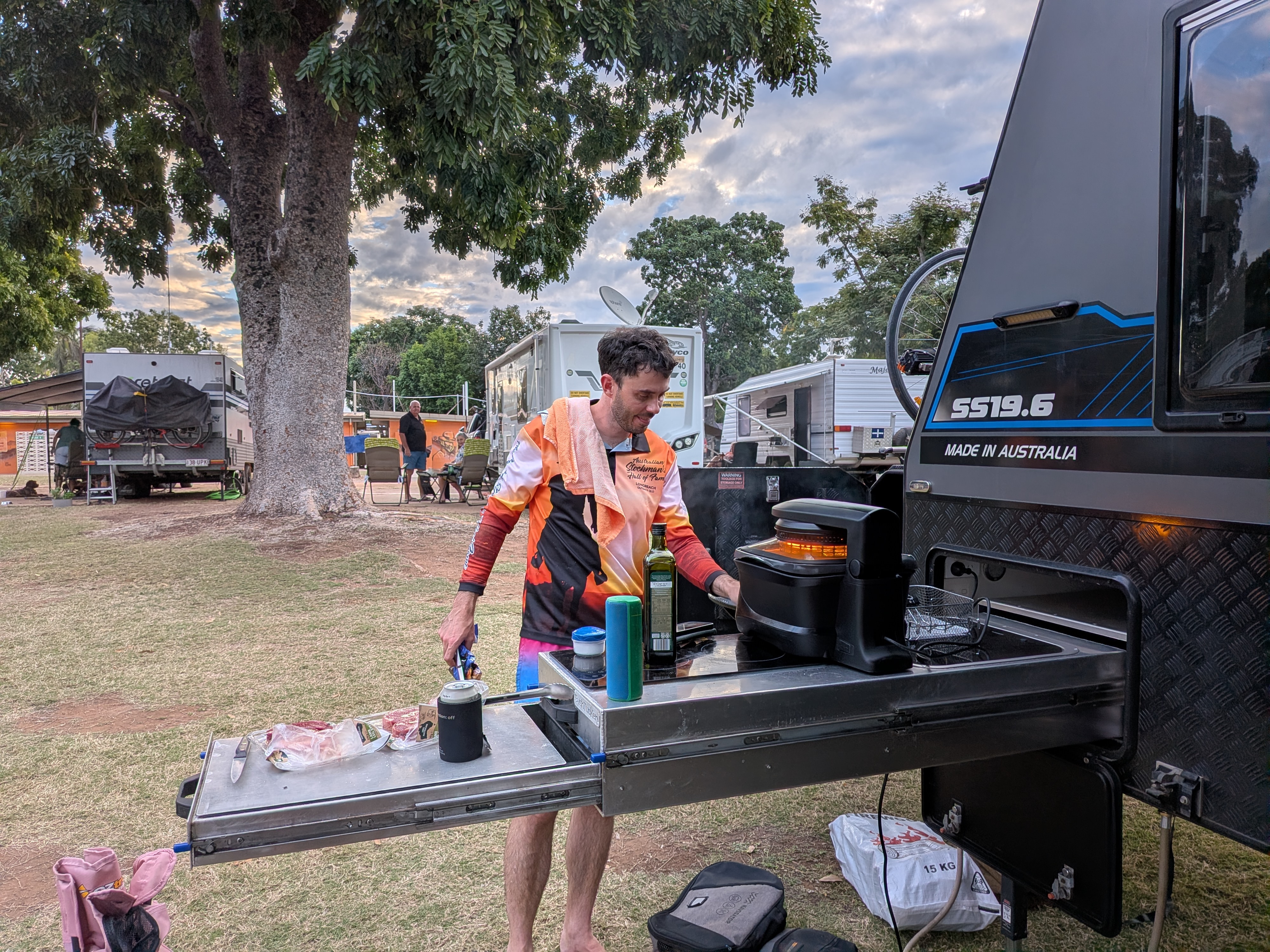 Dylan making coffee at the outdoor kitchen on TITANIUM HARDCORE