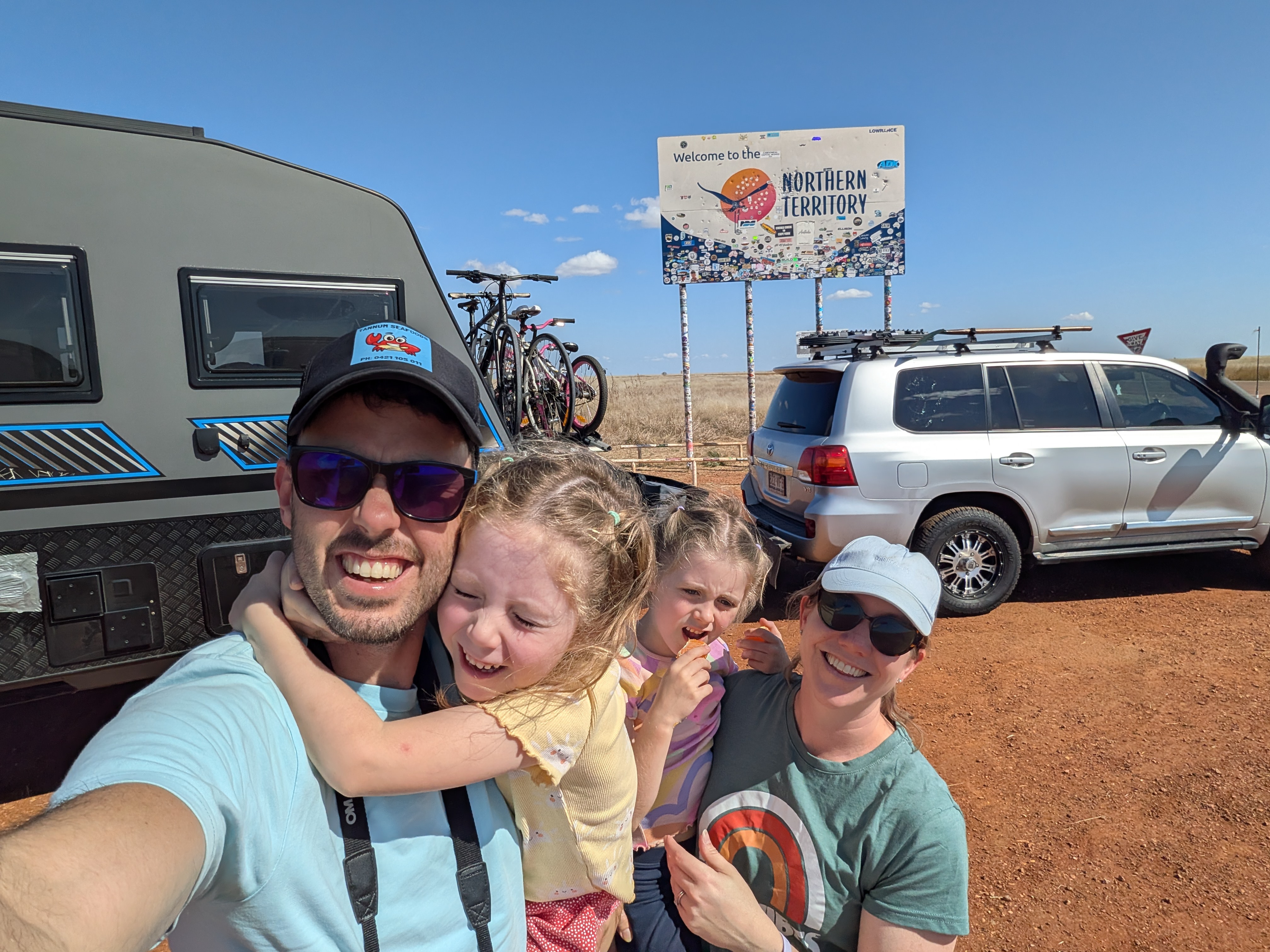Family selfie at the NT border sign