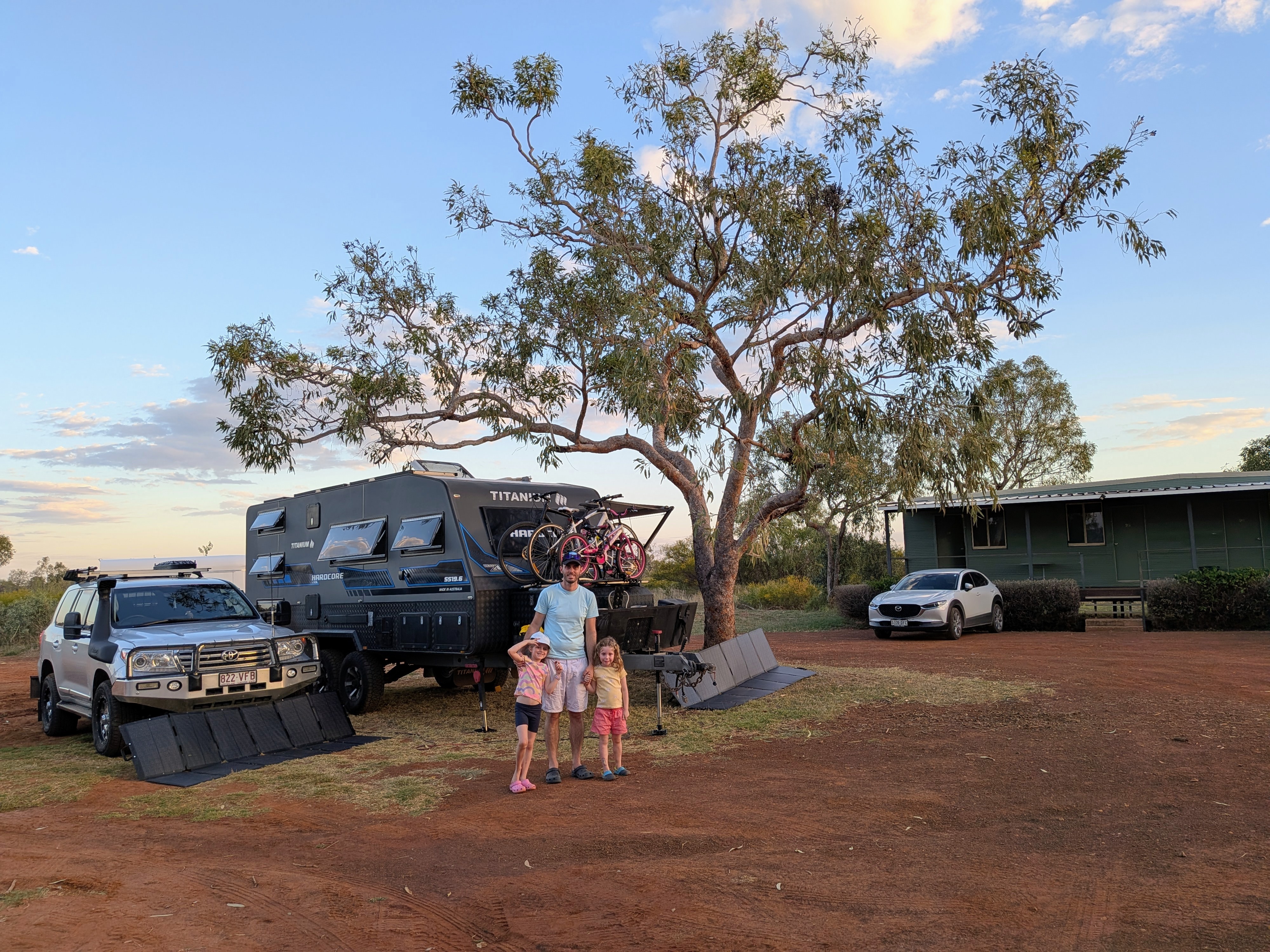 Erin and the girls in front of Reg and TITANIUM HARDCORE at Barkly Homestead