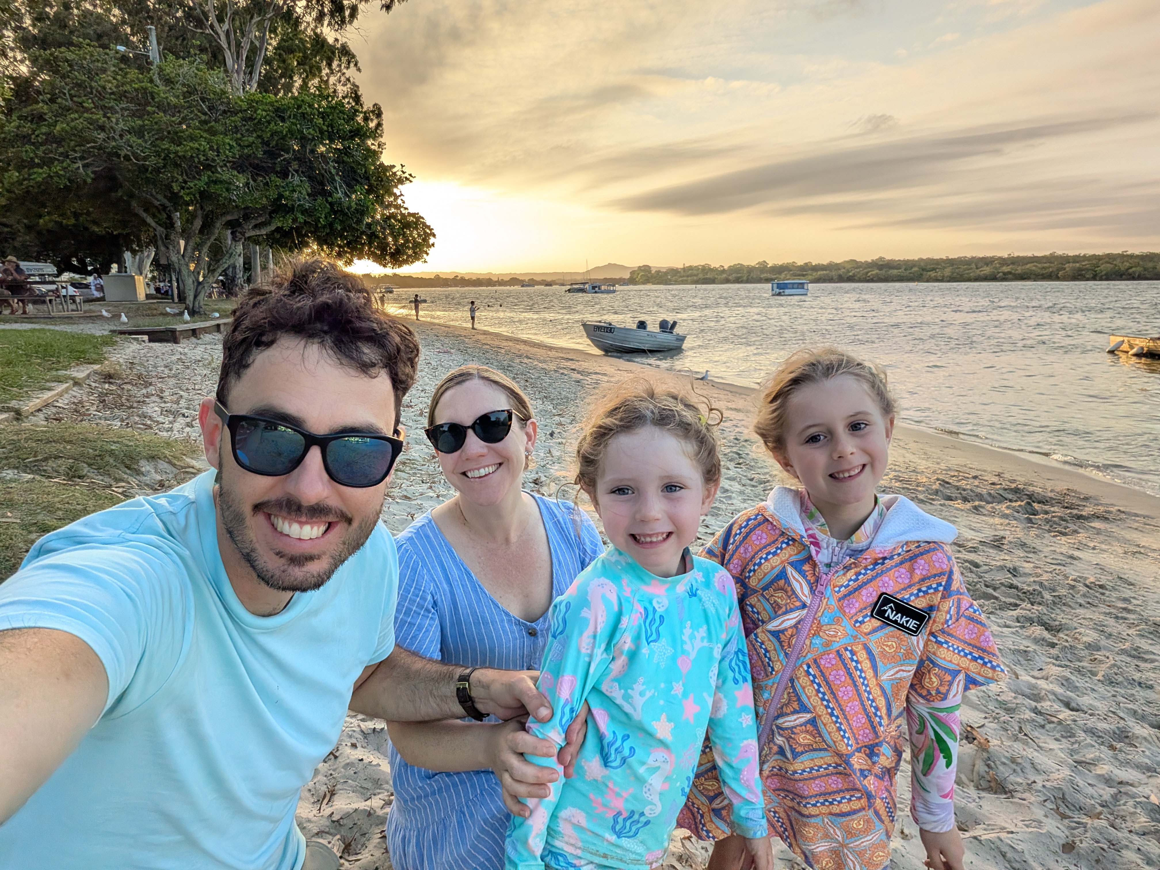 The Saunders family at sunset on the beach